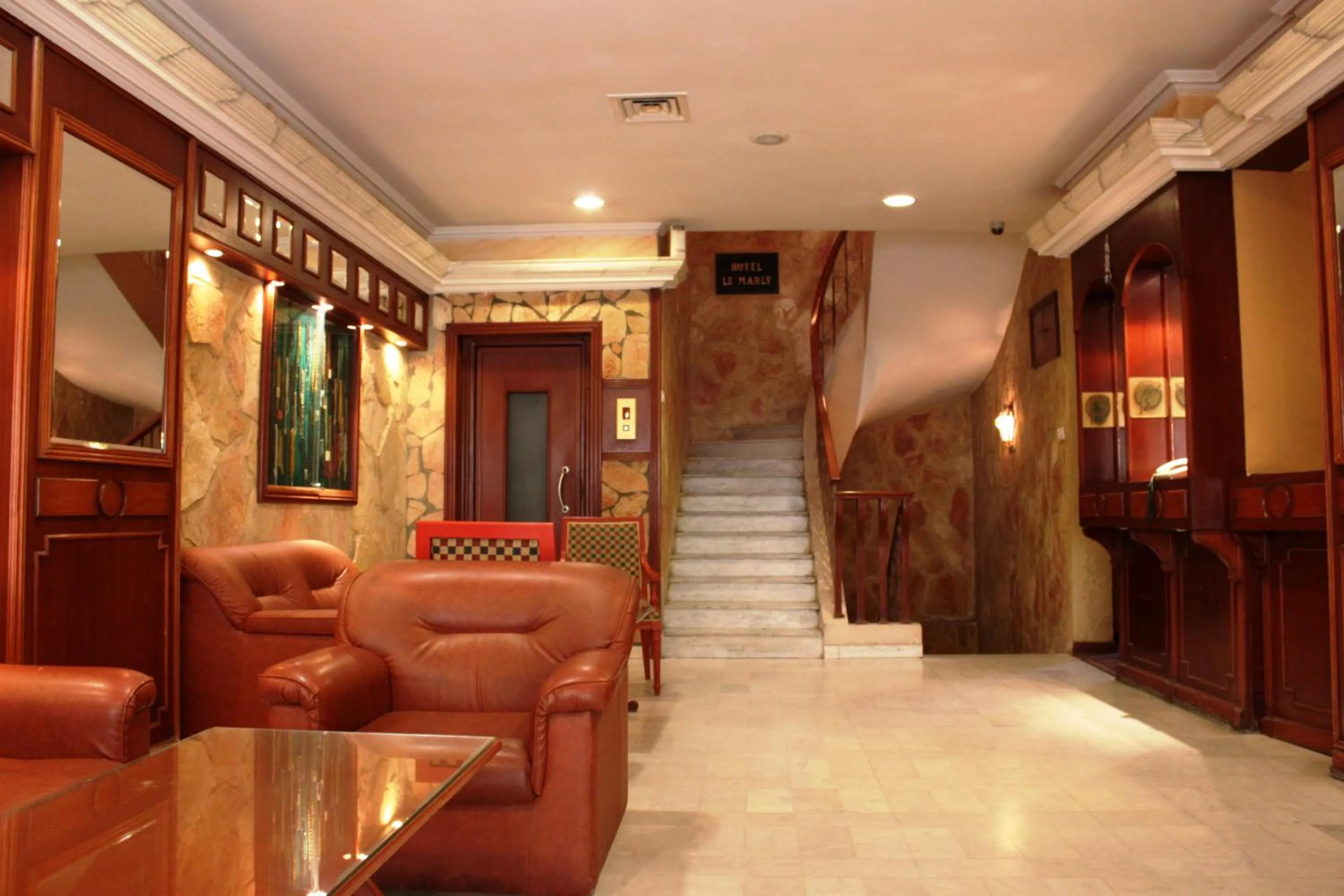 Lobby or reception in Le Marly Hotel