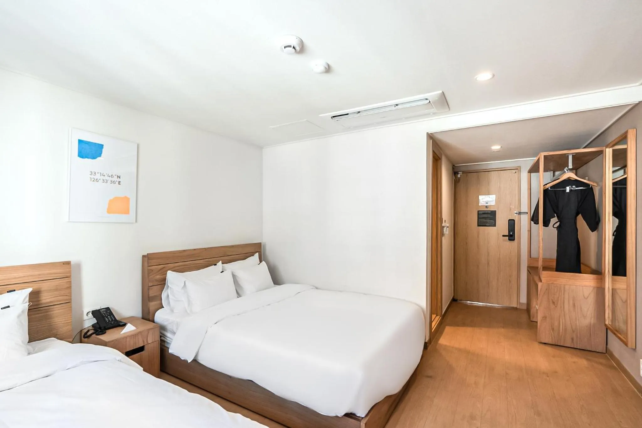 Bed in Heyy Seogwipo Hotel