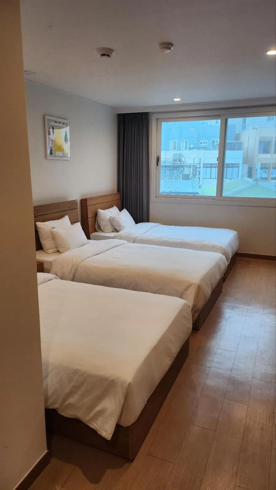 Bed in Heyy Seogwipo Hotel