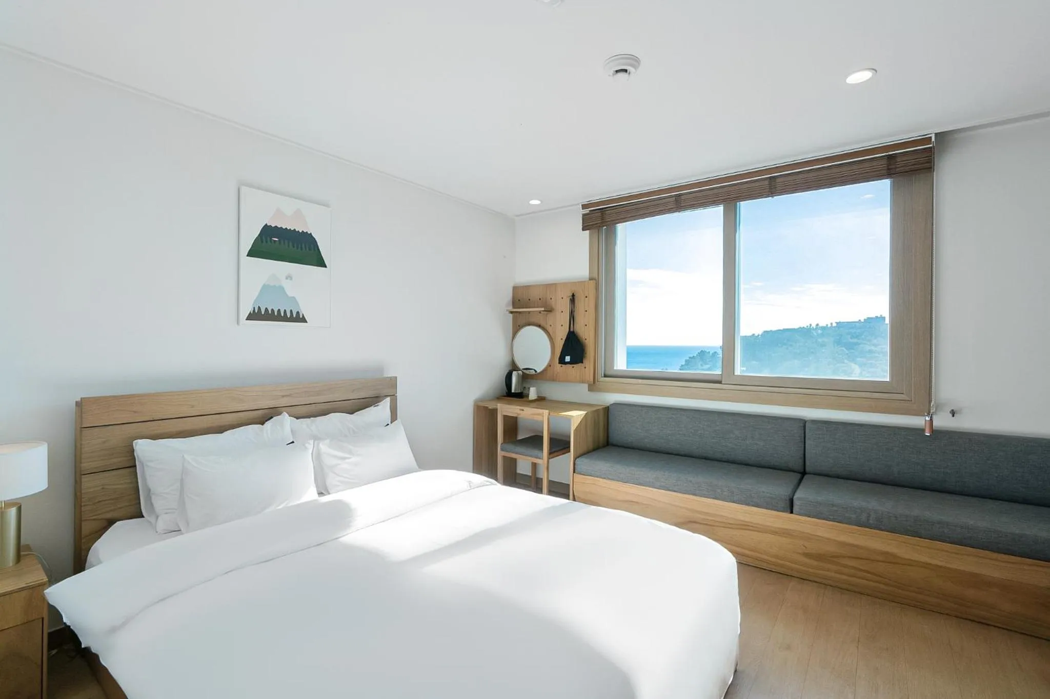 Bed in Heyy Seogwipo Hotel