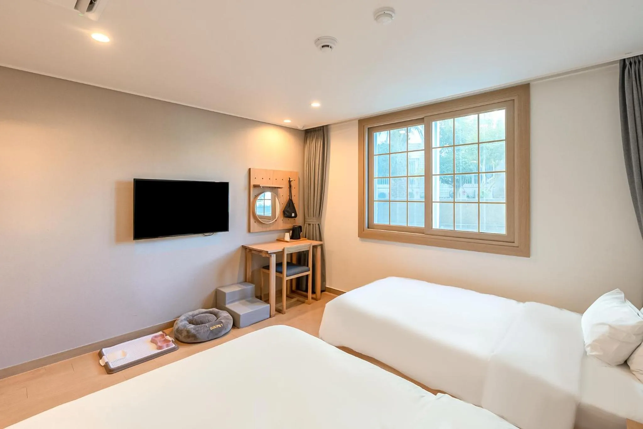 Bed in Heyy Seogwipo Hotel