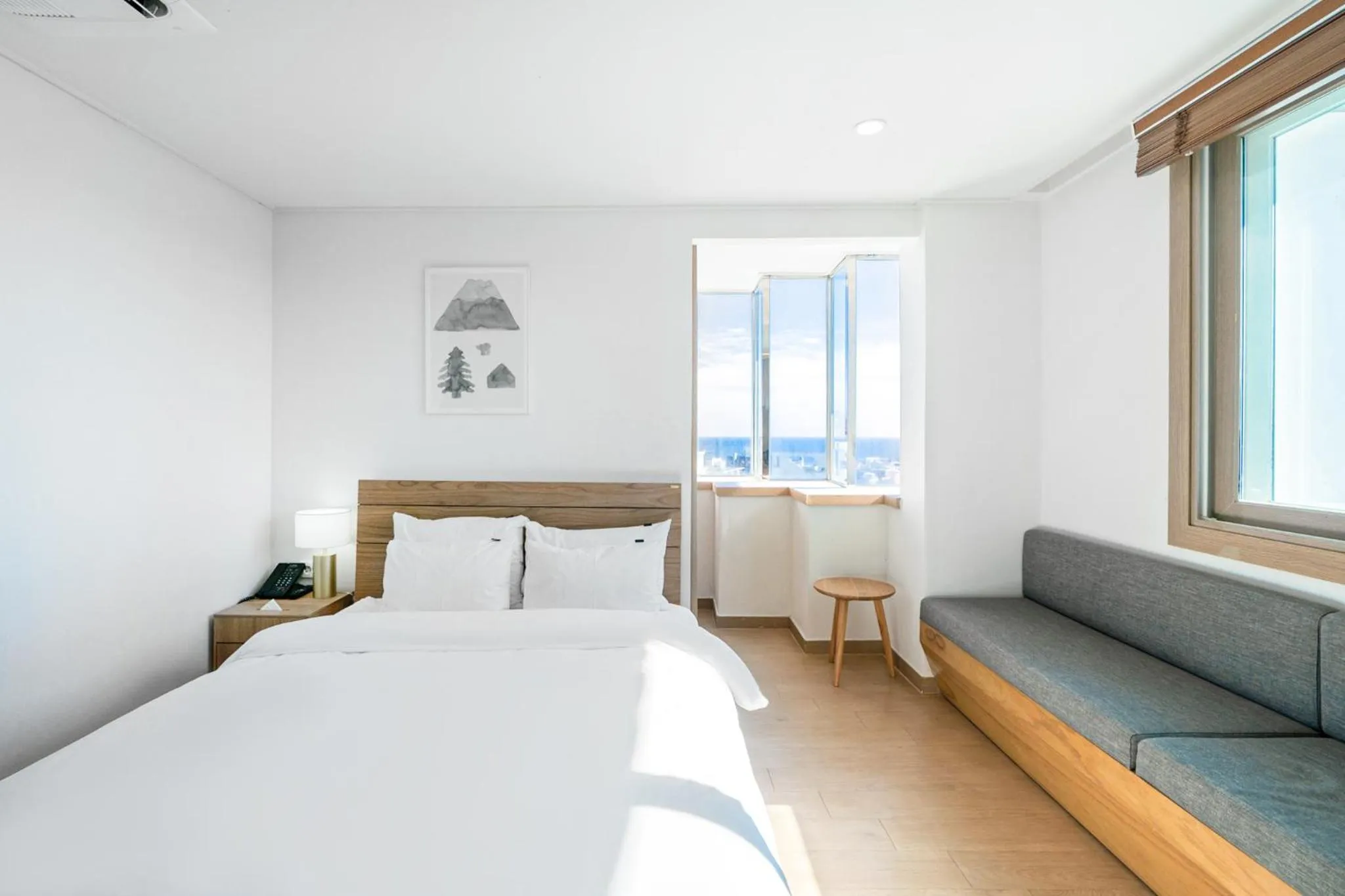 Bed in Heyy Seogwipo Hotel