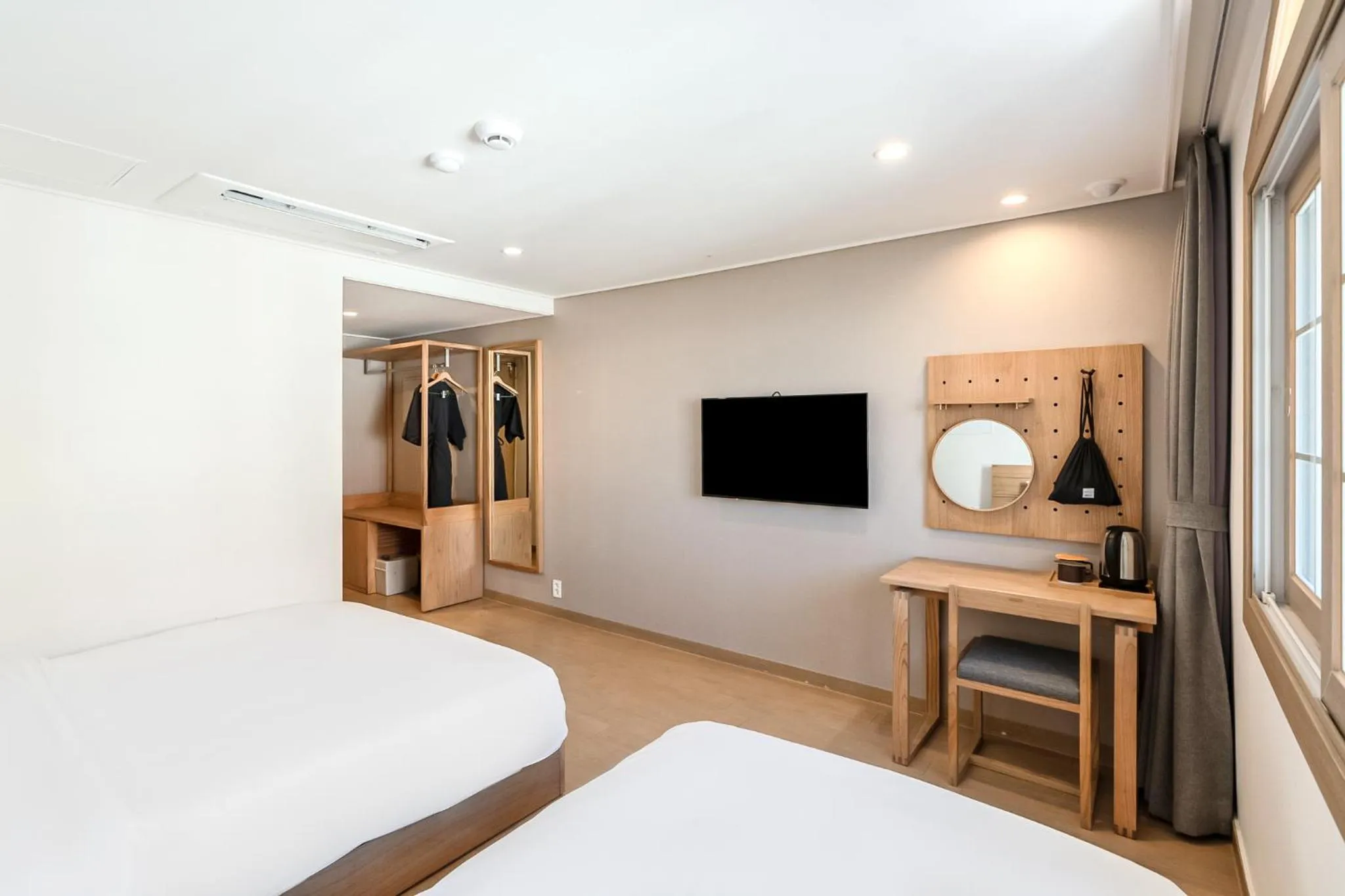 Bed in Heyy Seogwipo Hotel