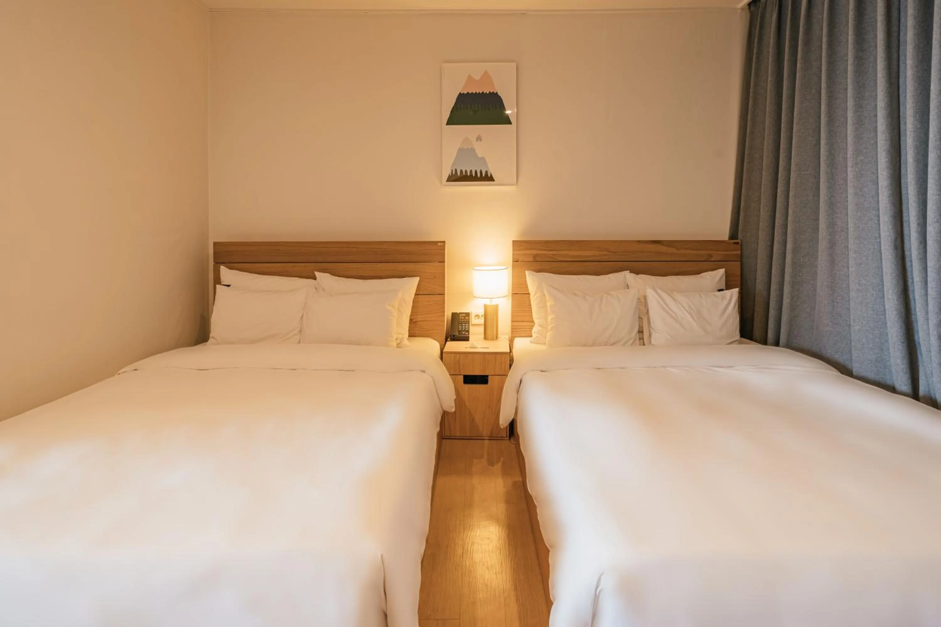 Bed in Heyy Seogwipo Hotel