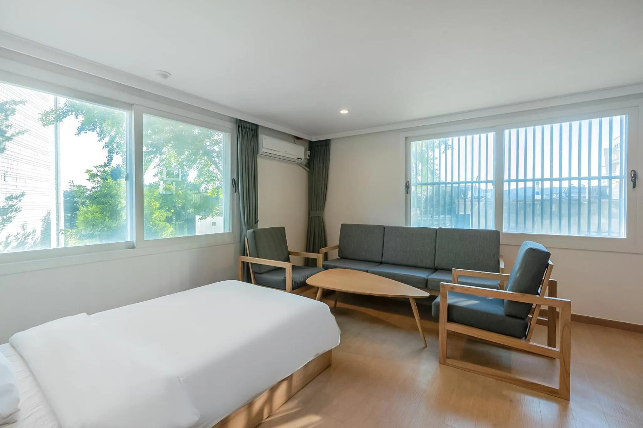 Bed in Heyy Seogwipo Hotel