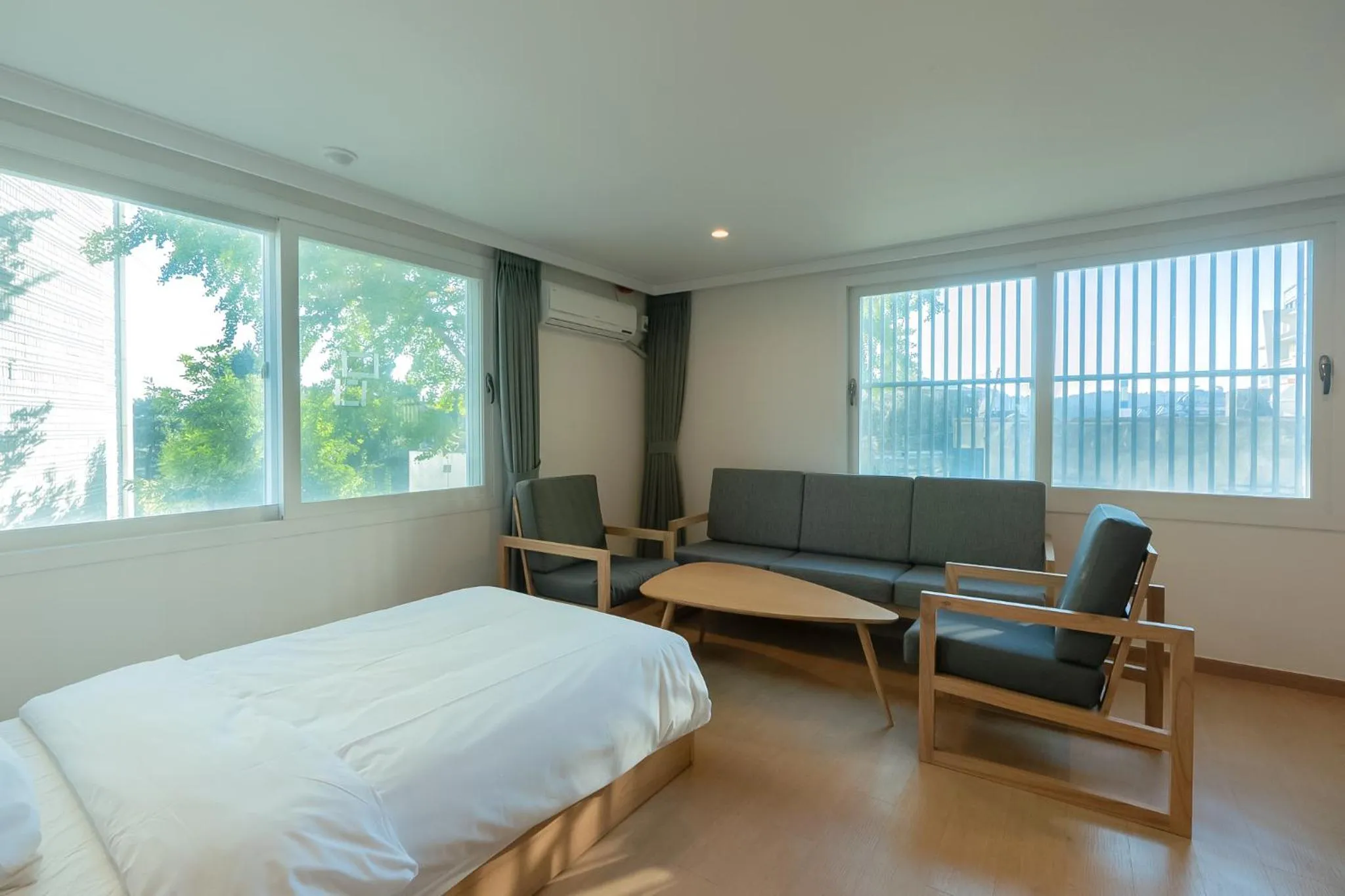 Bed in Heyy Seogwipo Hotel