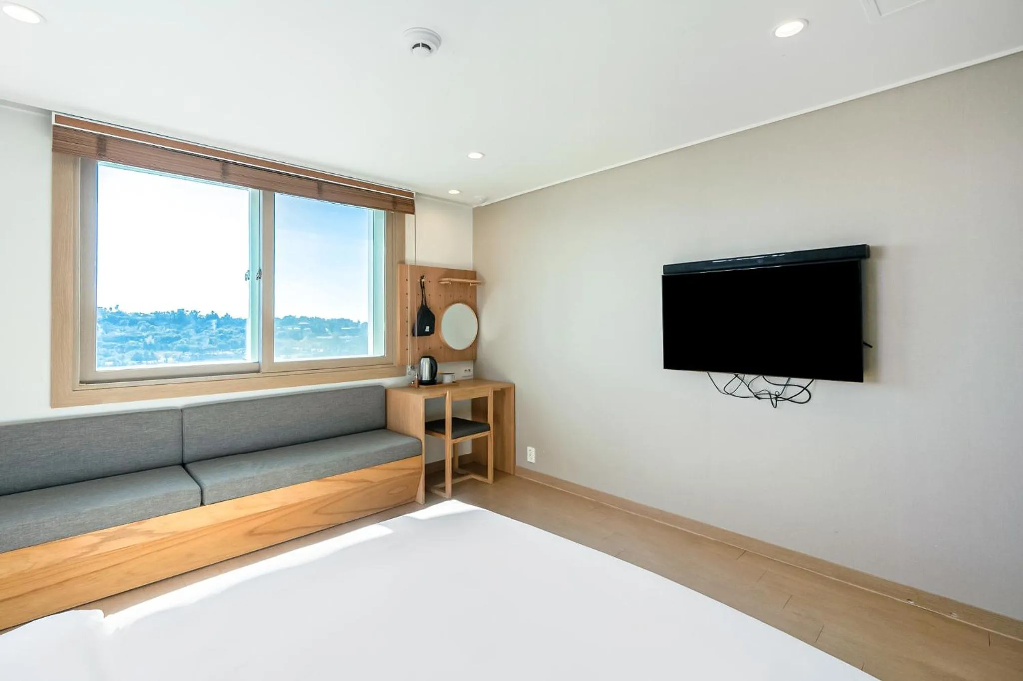 Bed in Heyy Seogwipo Hotel