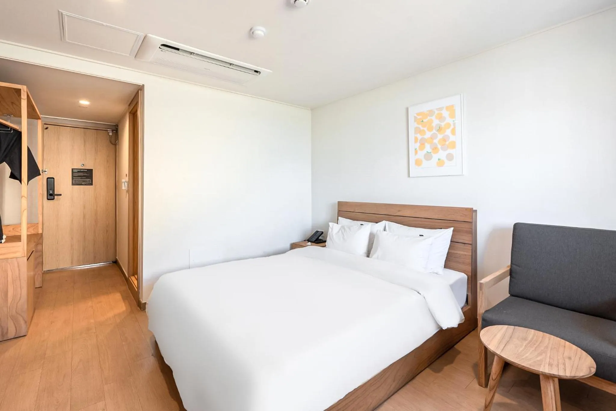 Bed in Heyy Seogwipo Hotel