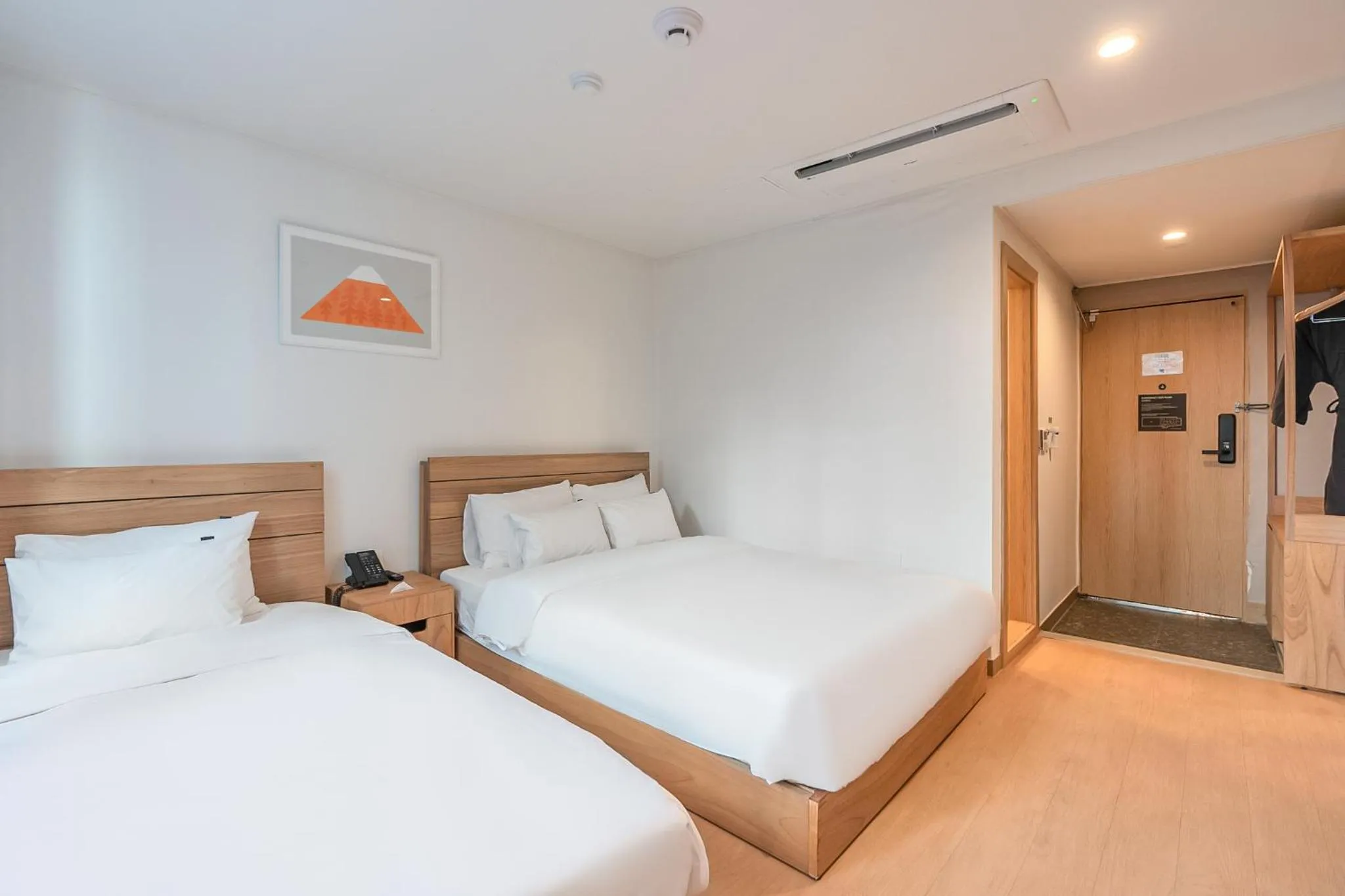 Bed in Heyy Seogwipo Hotel