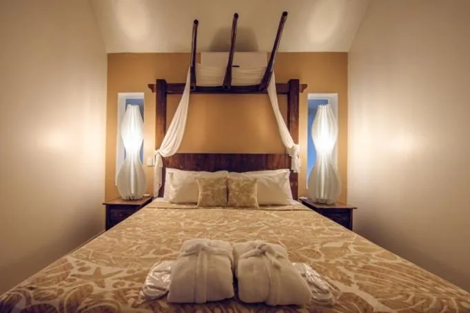 Bed in Crown Beach Resort & Spa