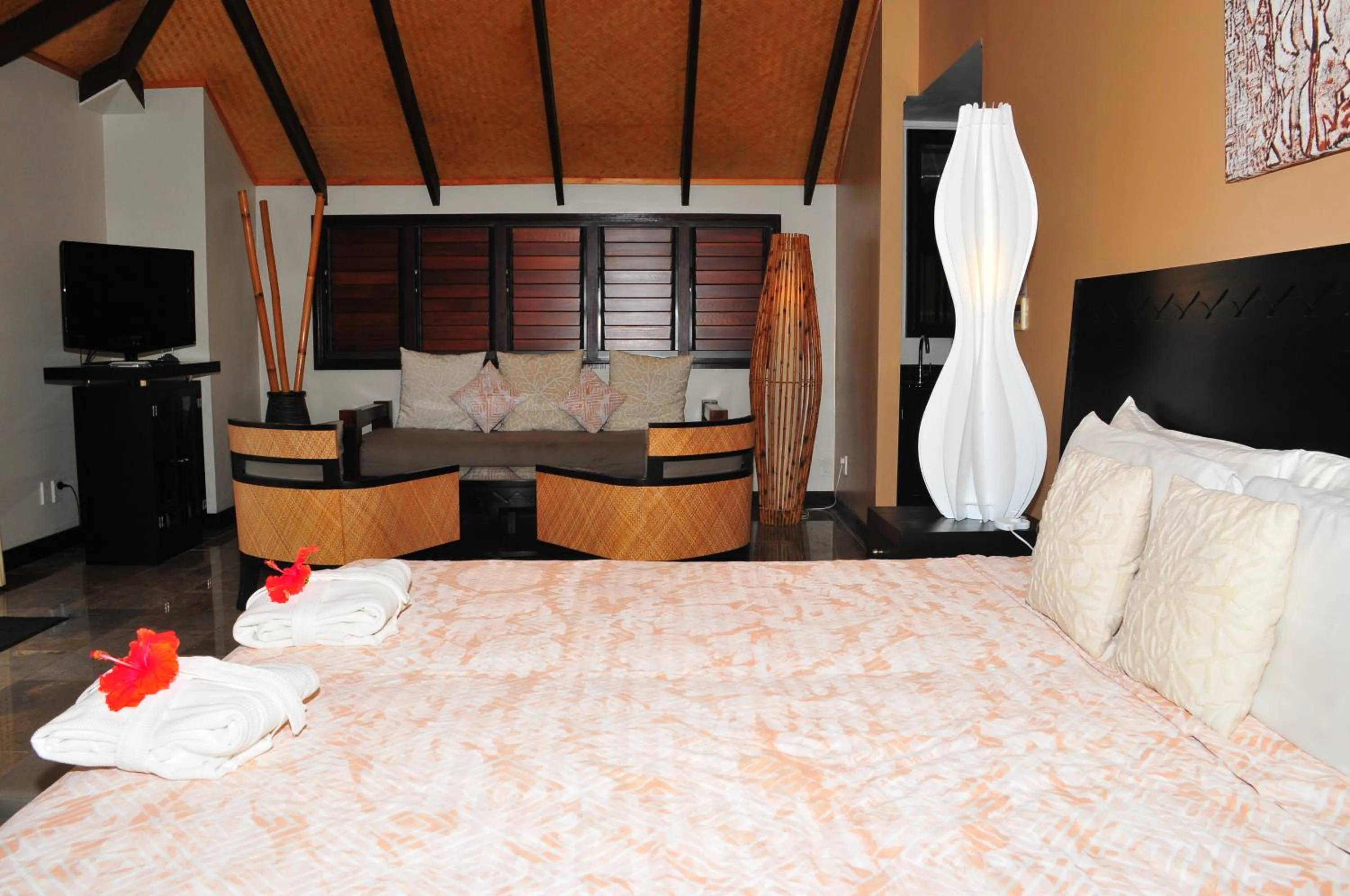 Bed in Crown Beach Resort & Spa