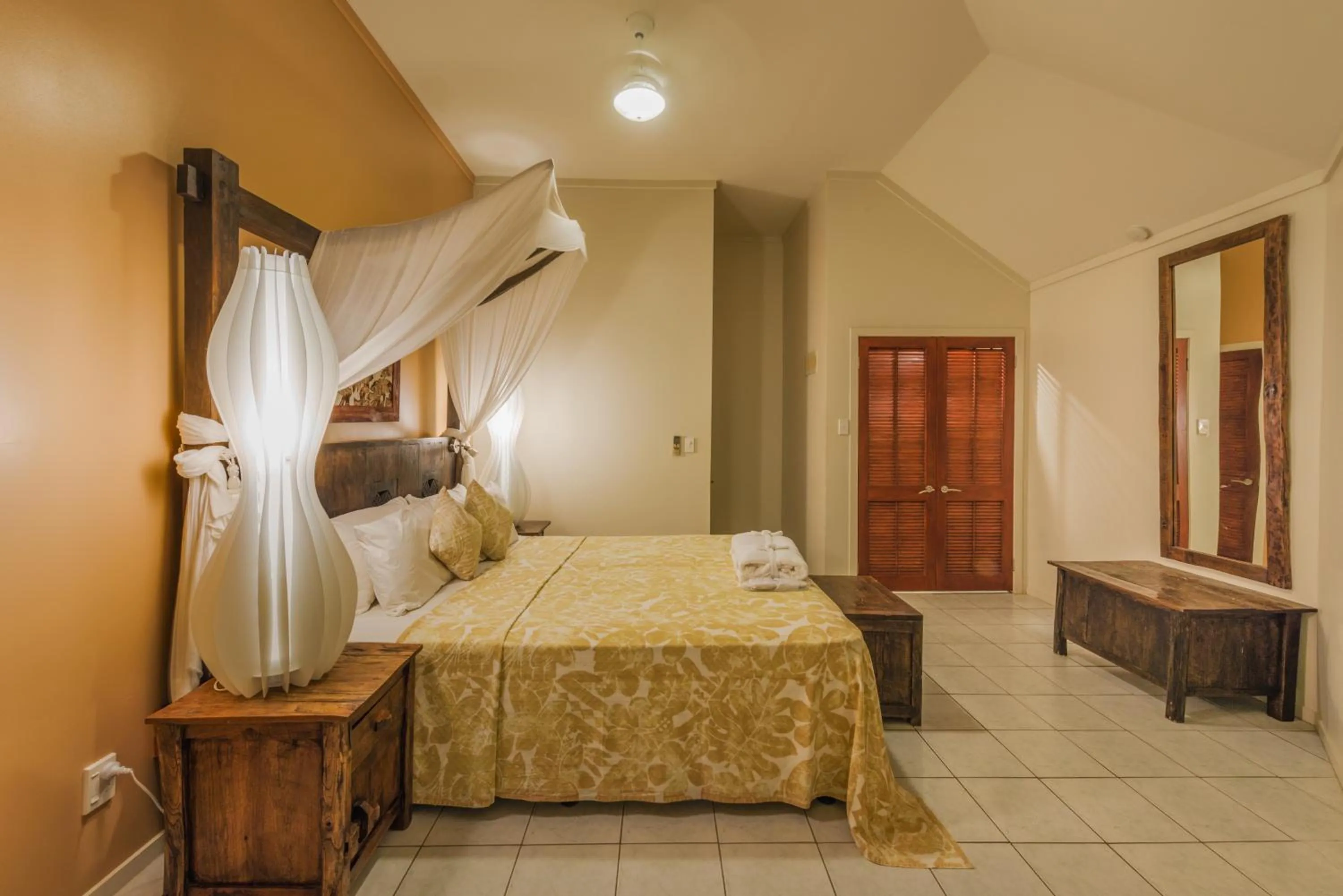 Bed in Crown Beach Resort & Spa