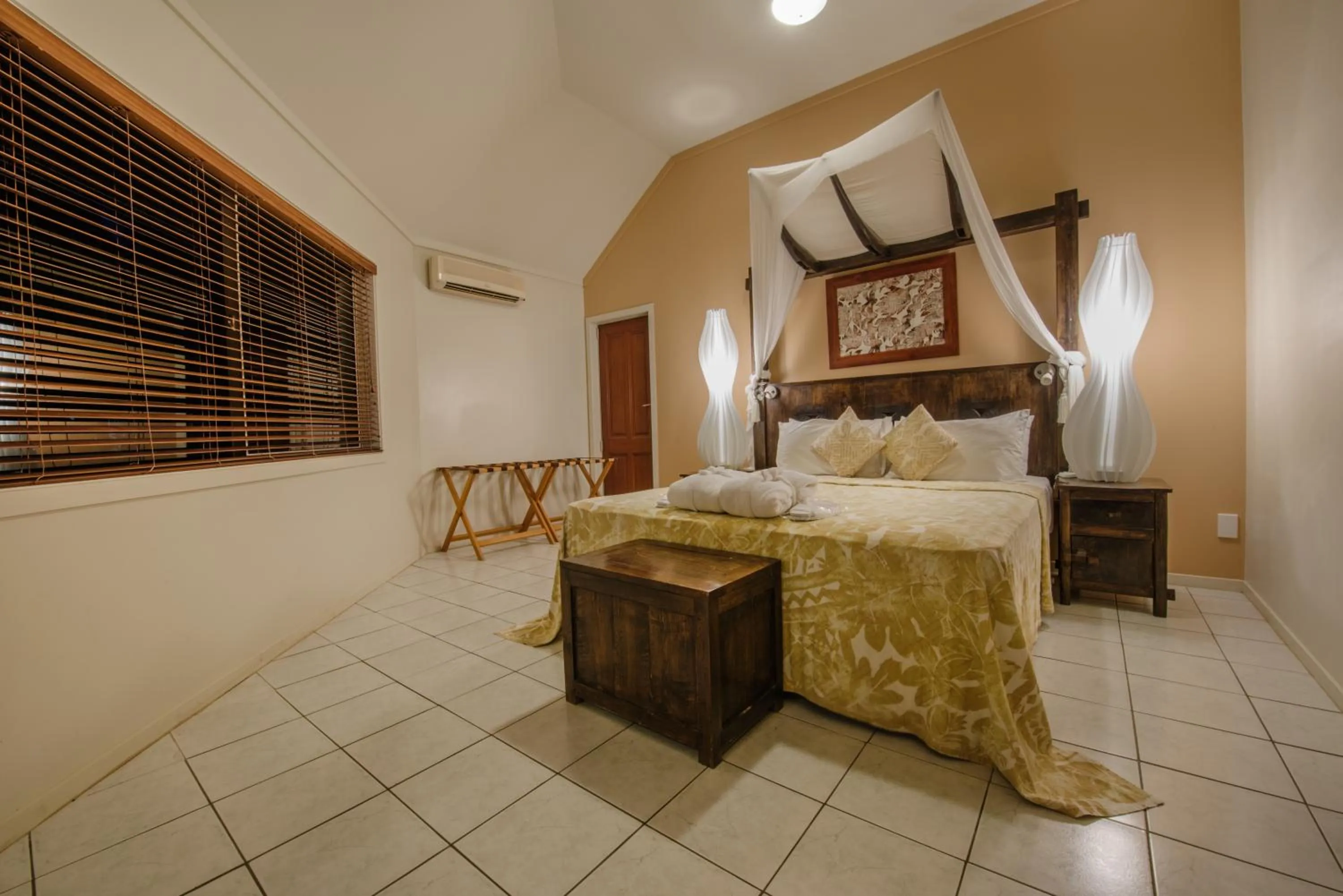 Bed in Crown Beach Resort & Spa