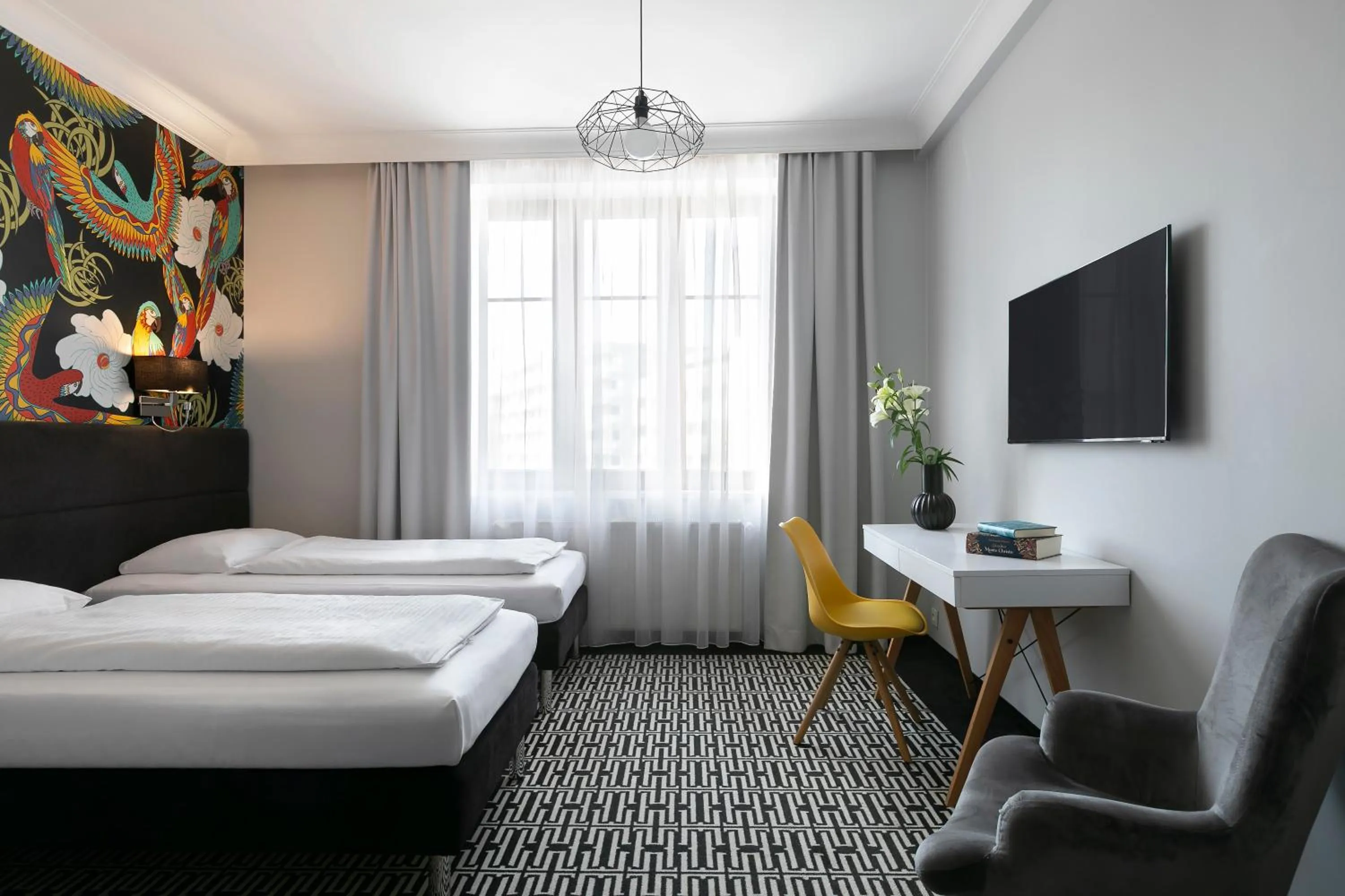 Bed in Liv'Inn Aparthotel