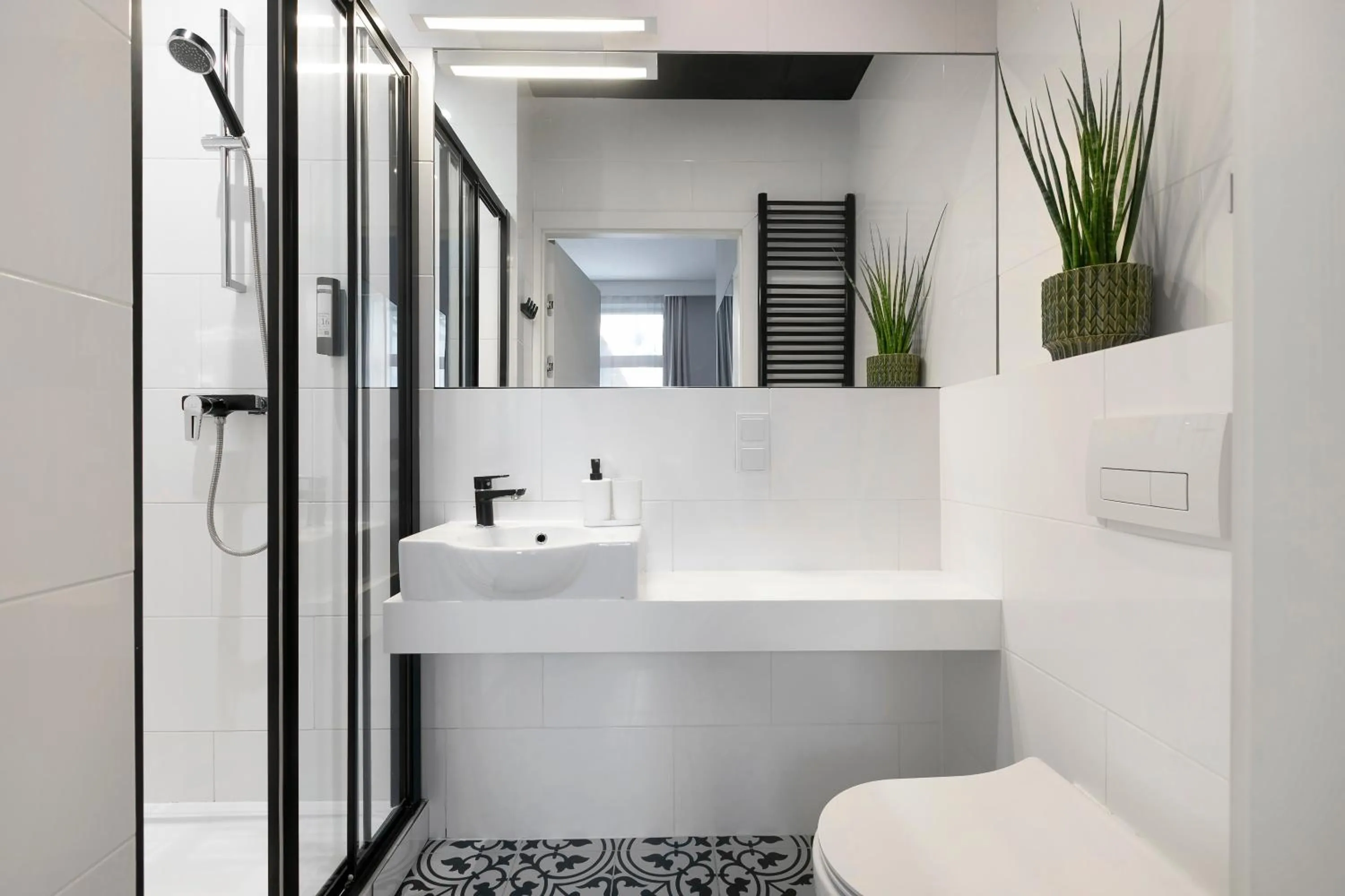 Shower in Liv'Inn Aparthotel