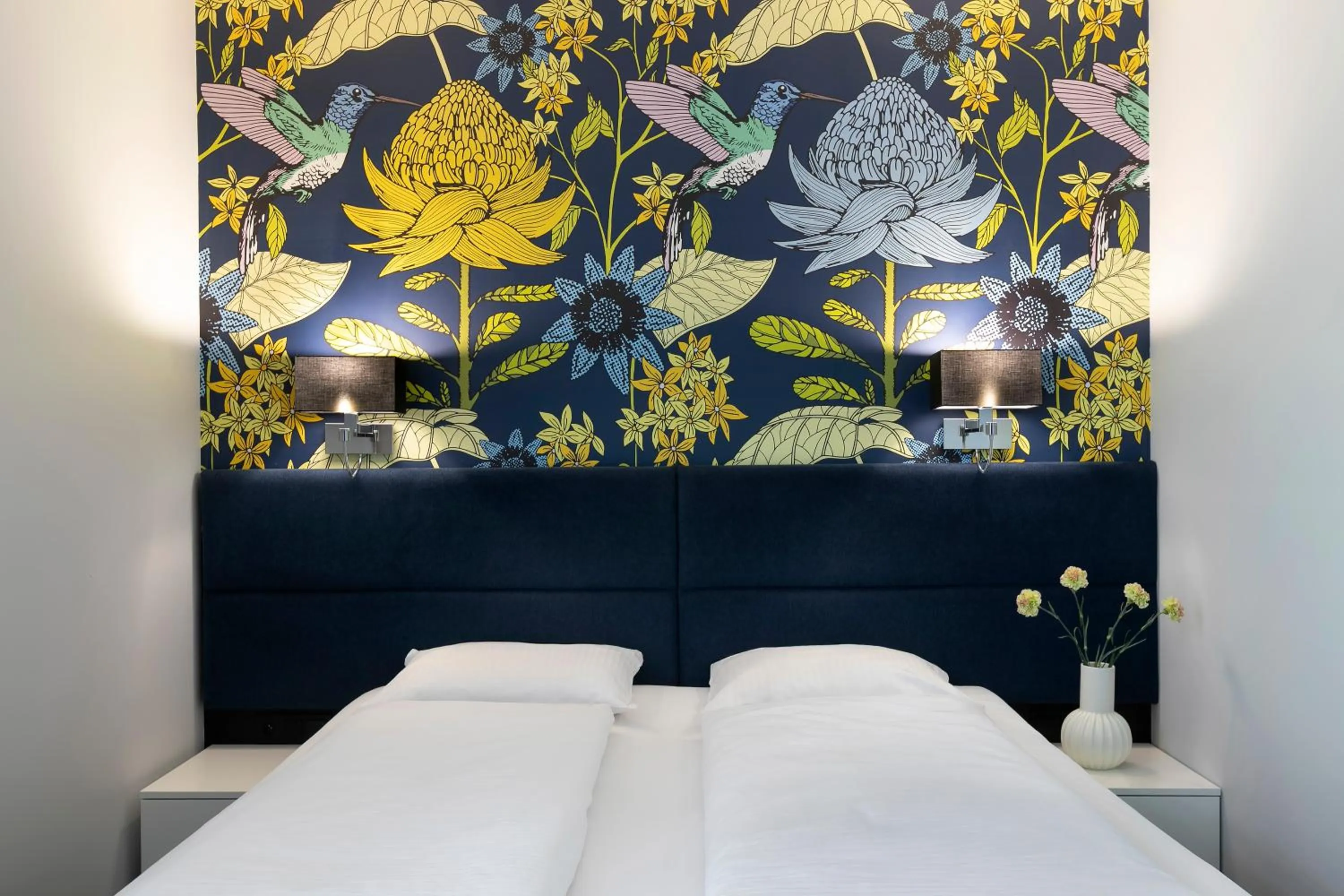 Bed in Liv'Inn Aparthotel