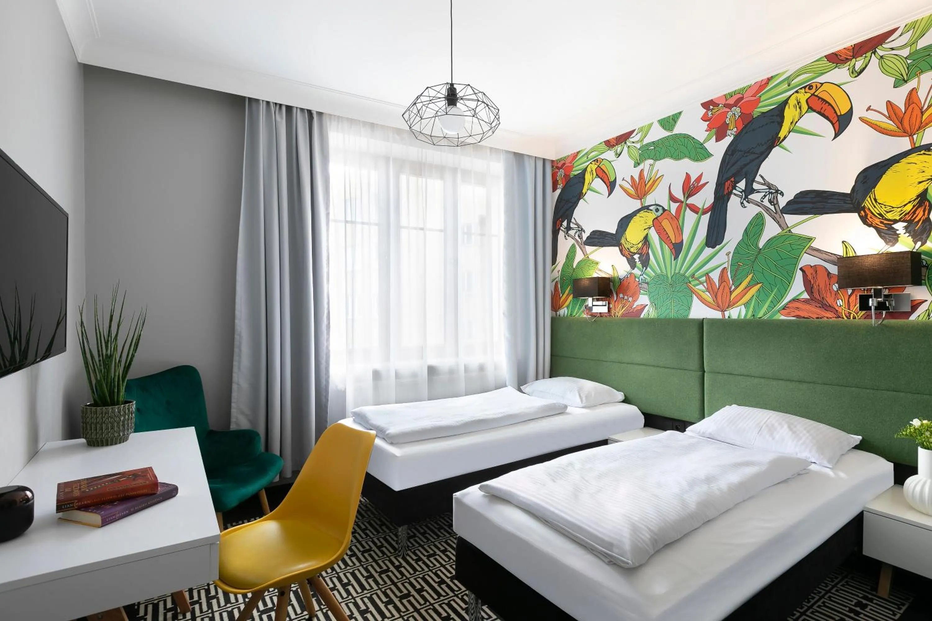 Bed in Liv'Inn Aparthotel