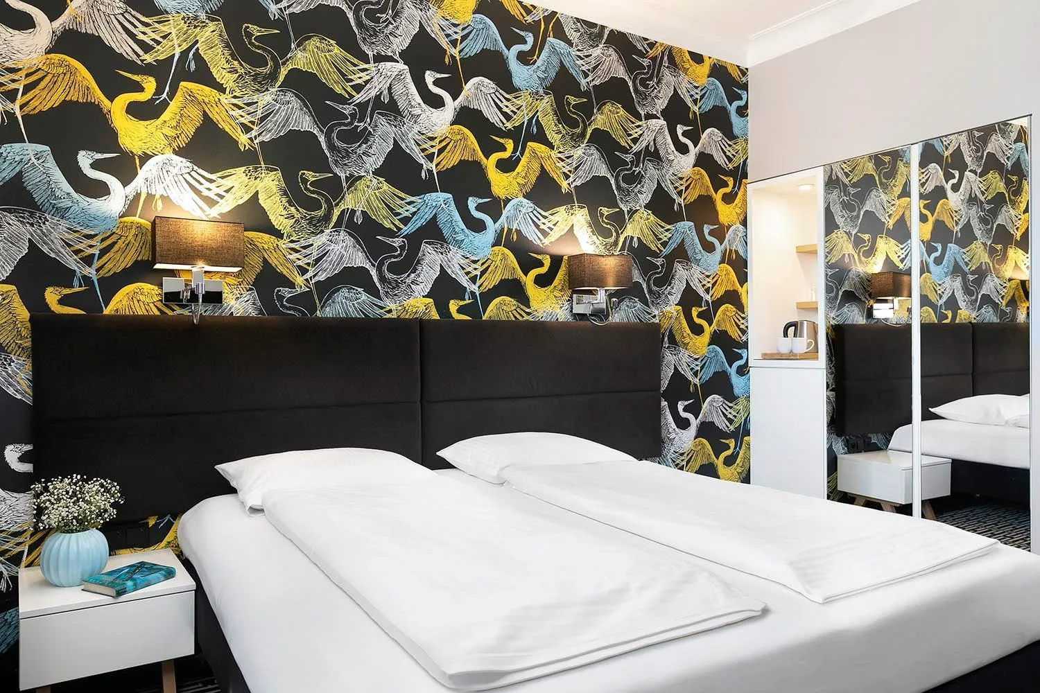 Bed in Liv'Inn Aparthotel