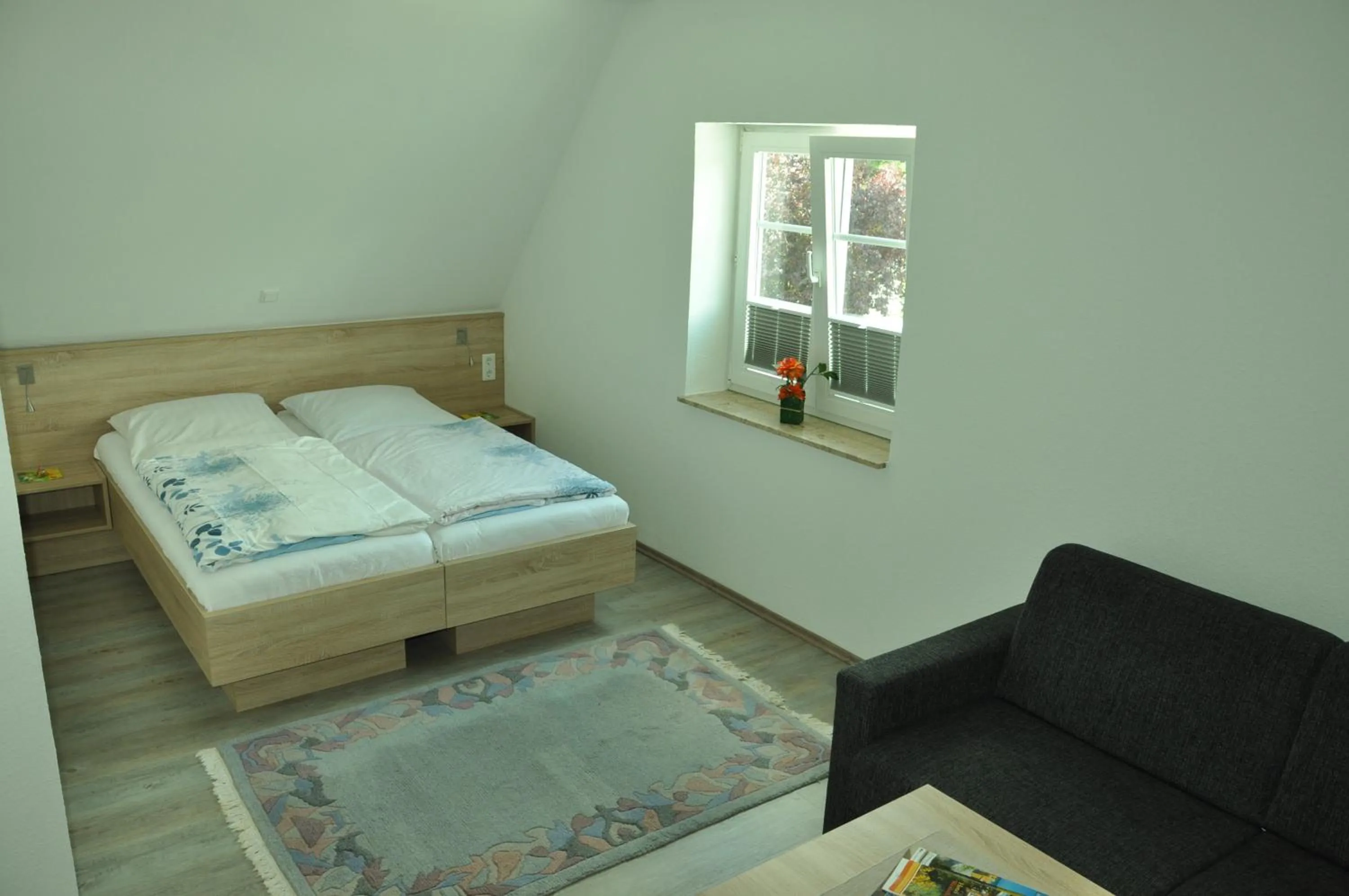 Photo of the whole room, Bed in Land-gut-Hotel Westerkrug