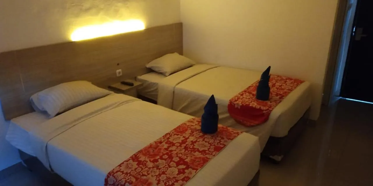 Bed in Mel's Inn Manado