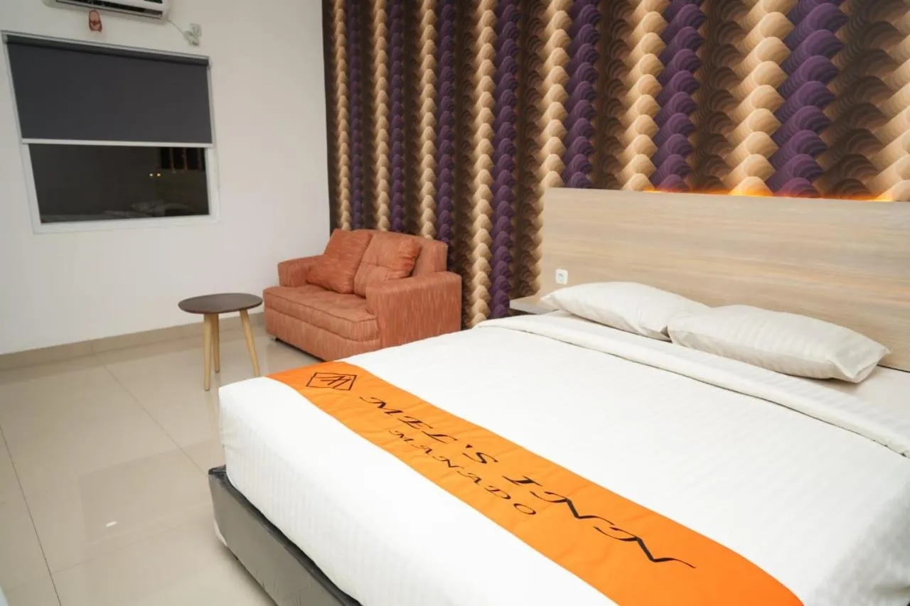 Bed in Mel's Inn Manado