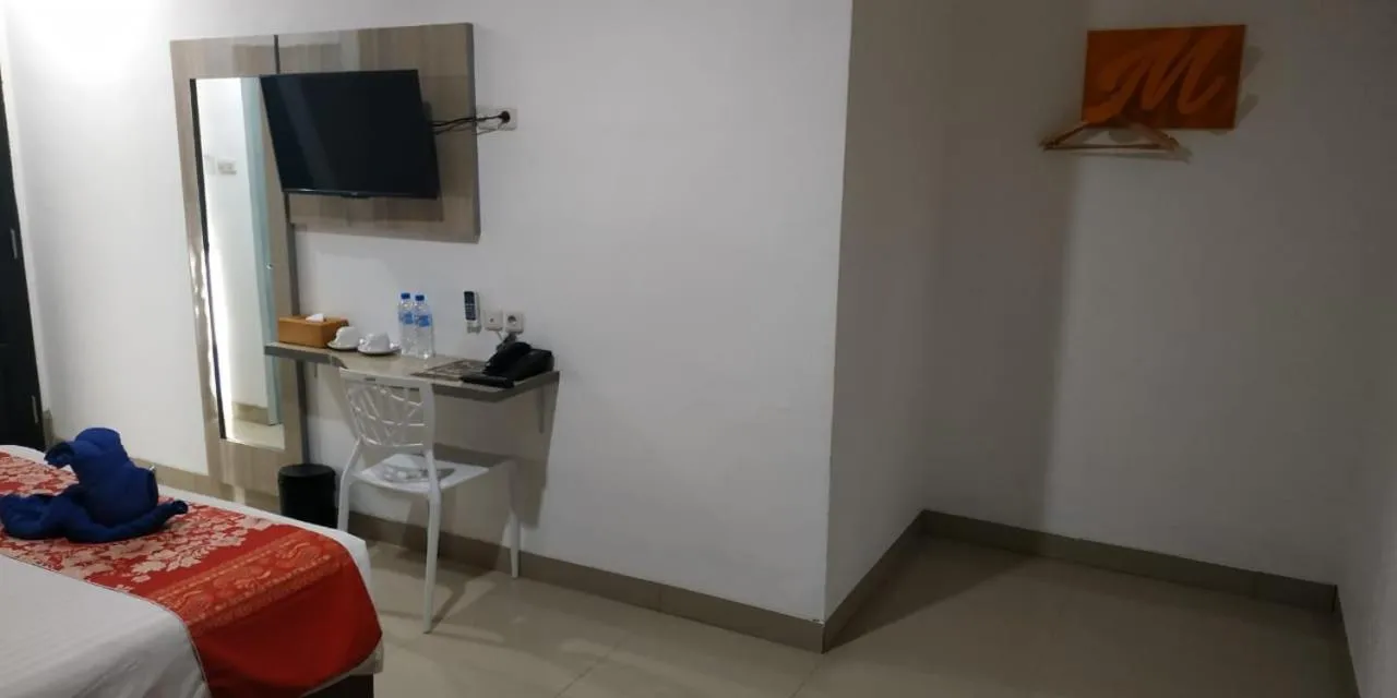 Bed in Mel's Inn Manado