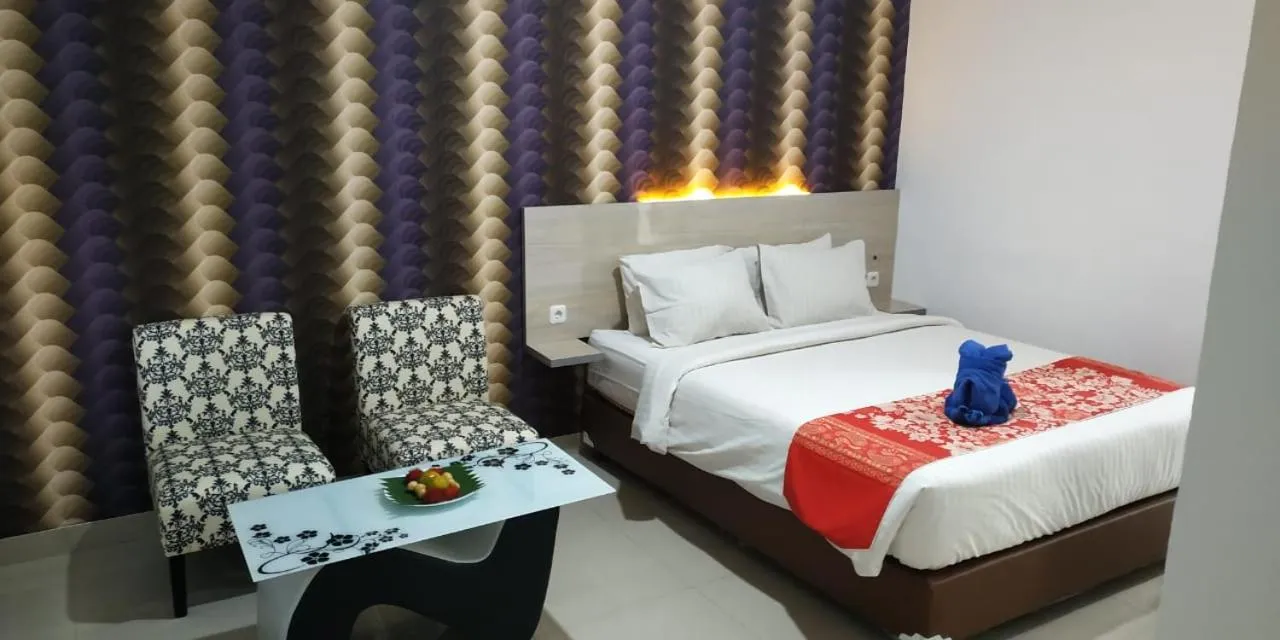 Bed in Mel's Inn Manado