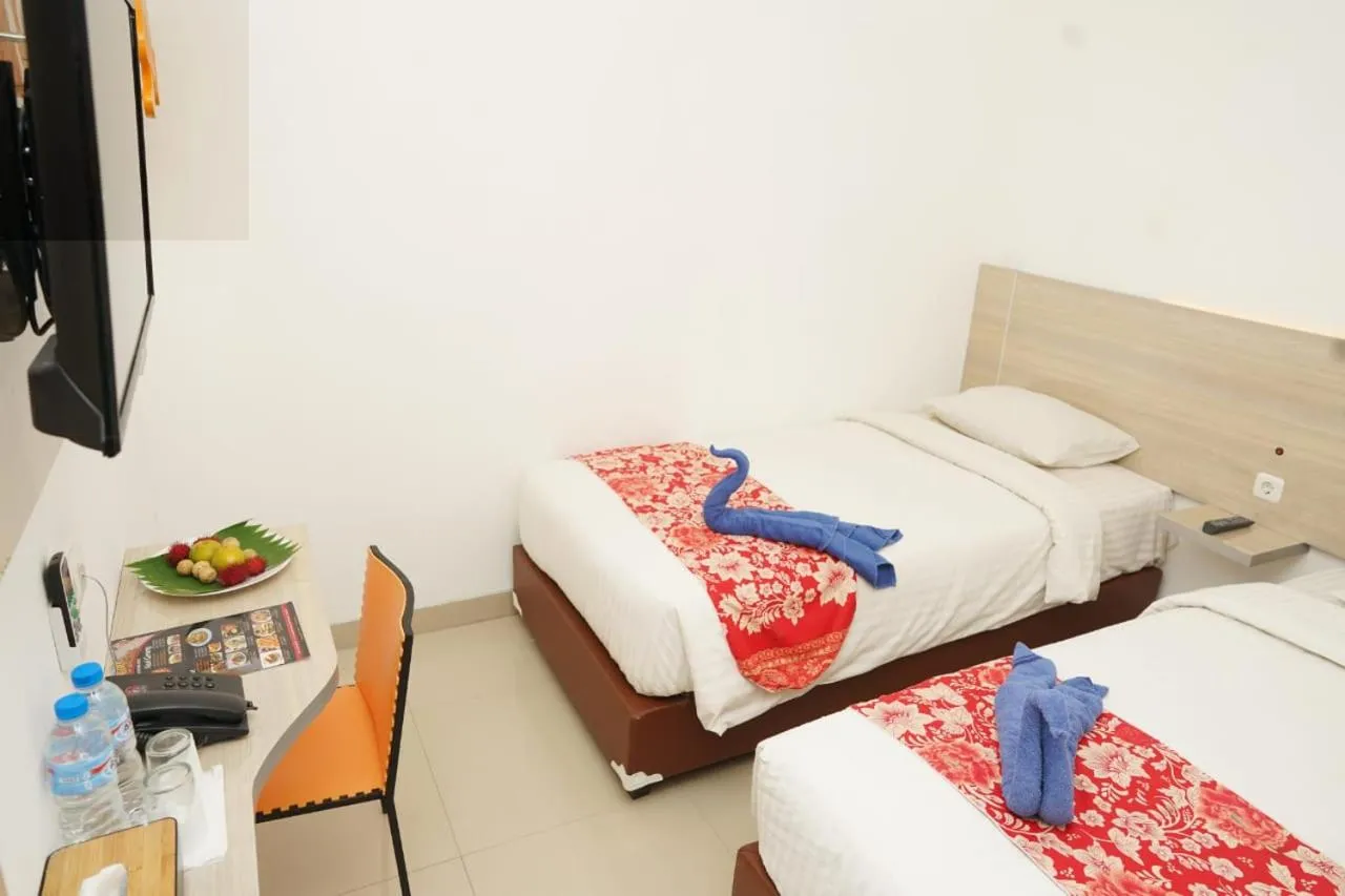 Bed in Mel's Inn Manado