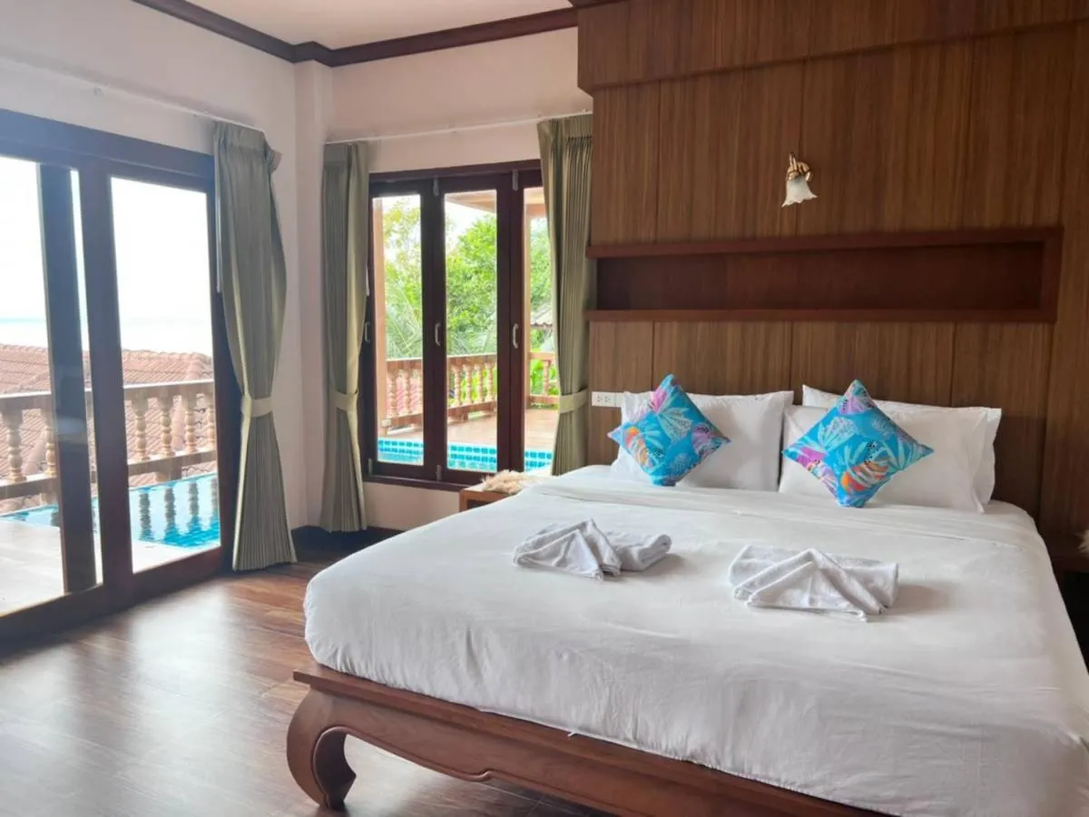 Pool view, Bed in Haad Yao Bayview Resort & Spa - SHA plus Certified