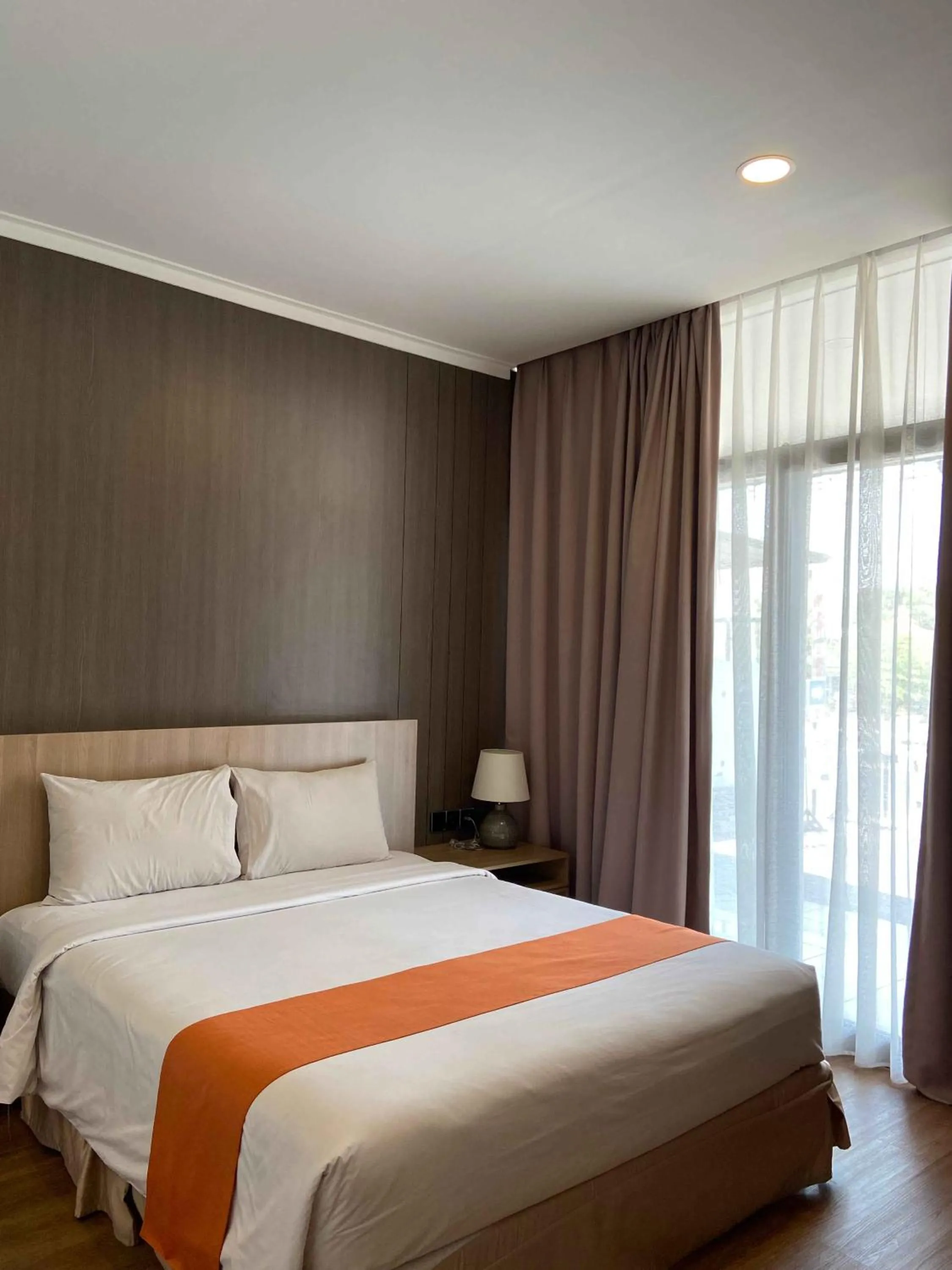 Bed in Green Red Hotel Syariah Jombang