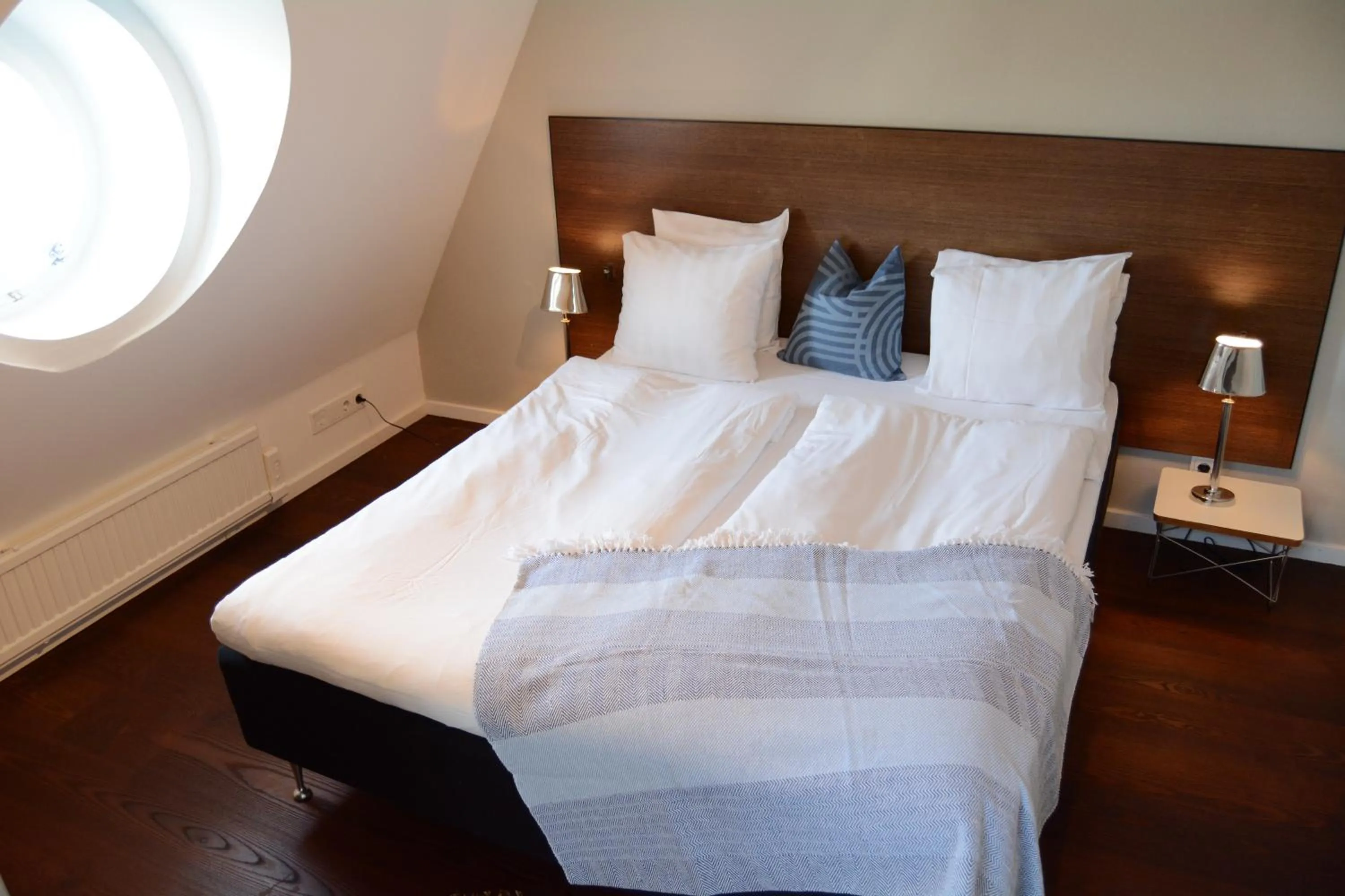 Bed in DA Hotel Apartments