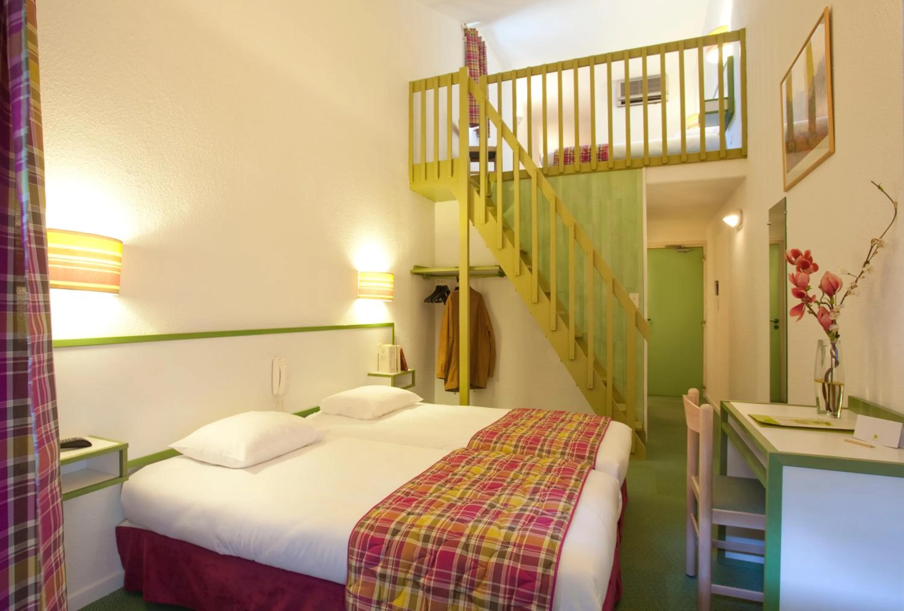 Bedroom in Logis Hôtel Restaurant Les Cèdres