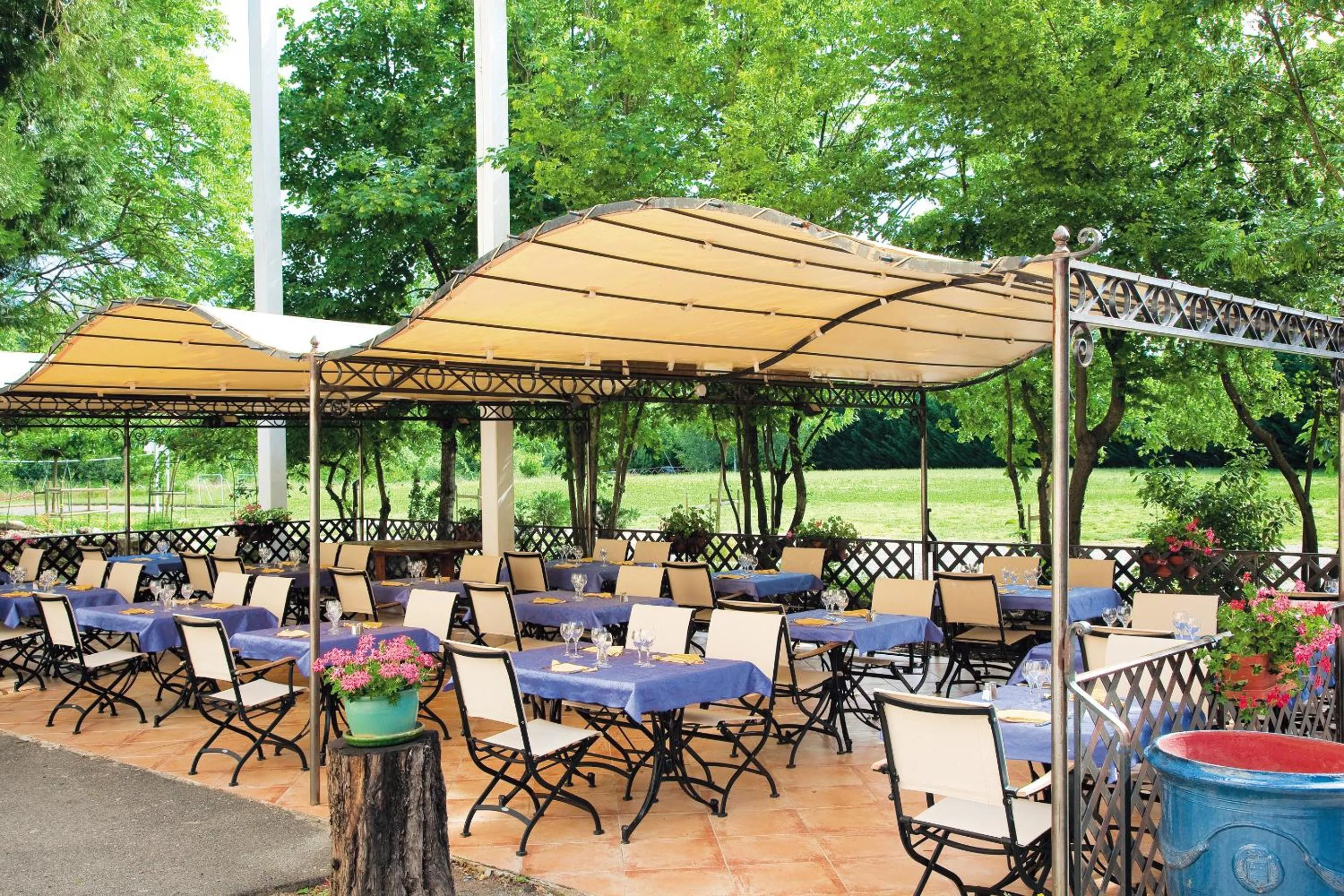 Patio in Logis Hôtel Restaurant Les Cèdres