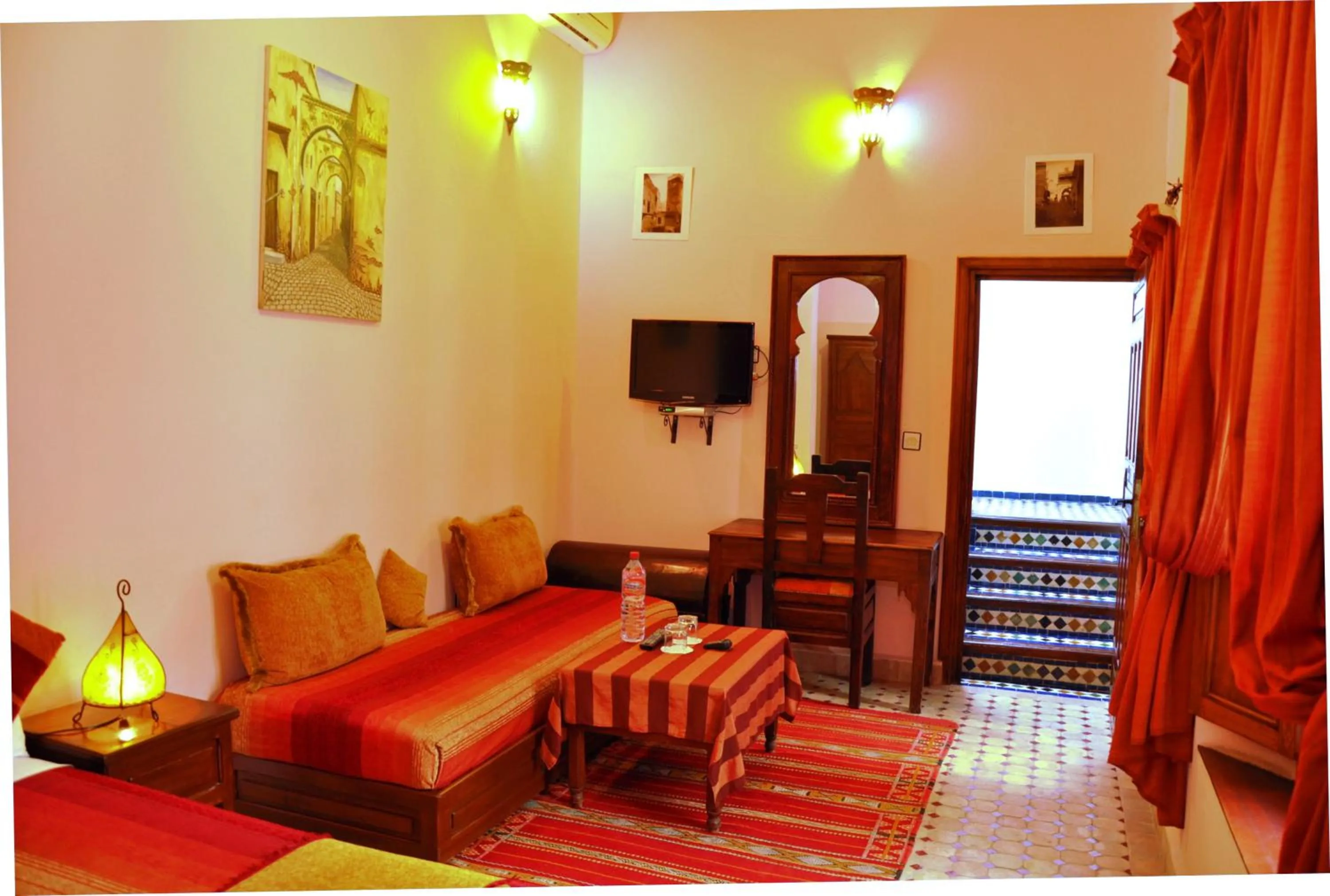 Seating area, Bed in Riad Ahlam