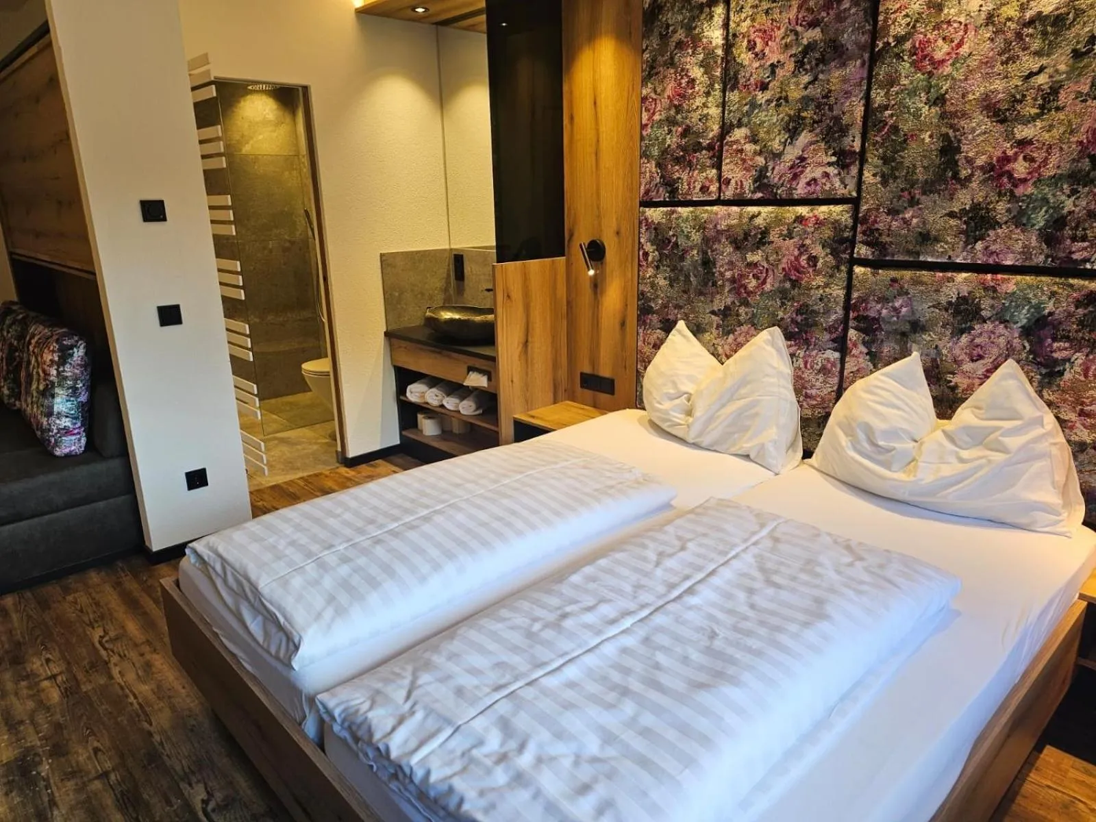 Photo of the whole room, Bed in first mountain Hotel Zillertal