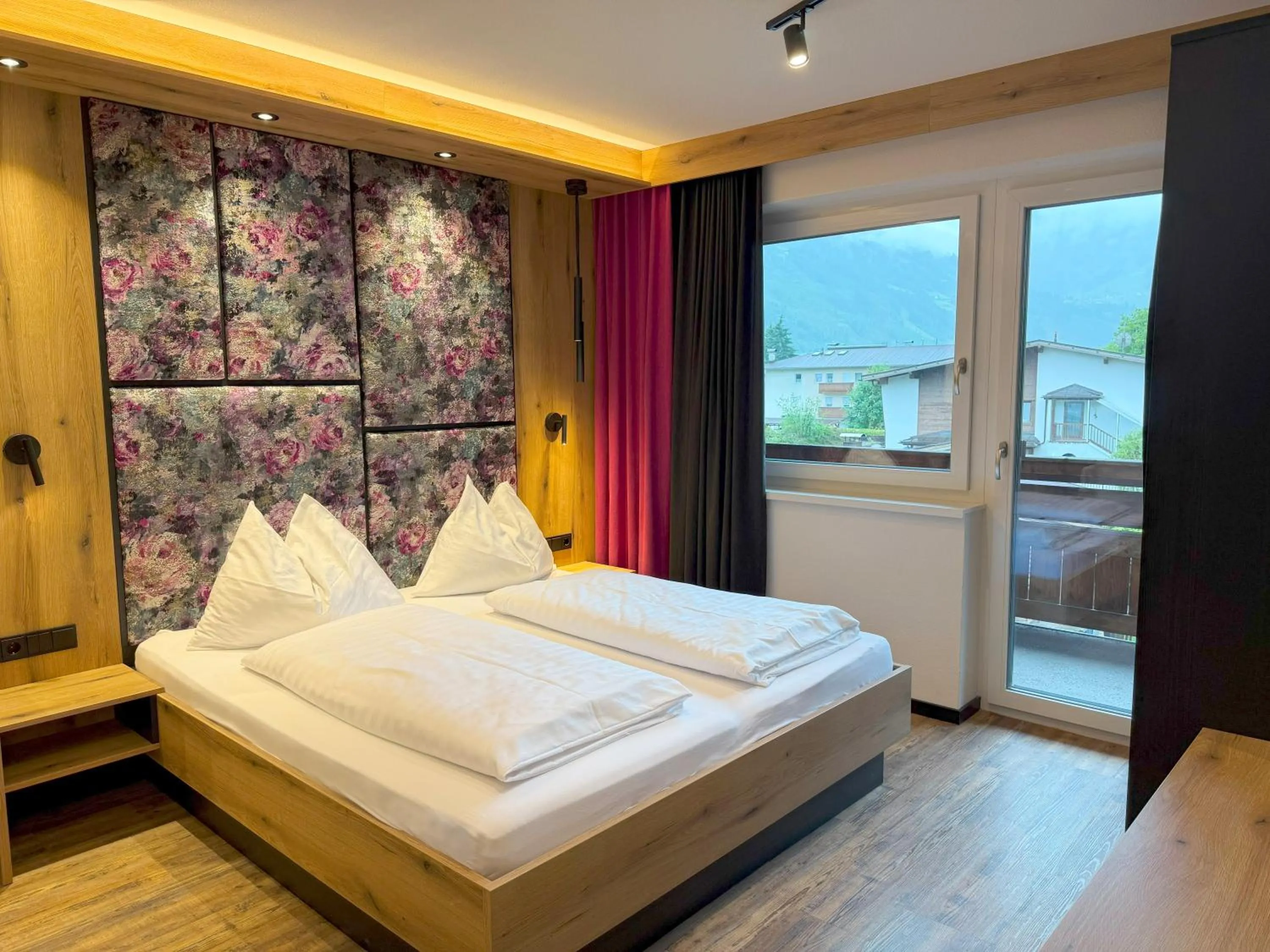 Bedroom, Bed in first mountain Hotel Zillertal