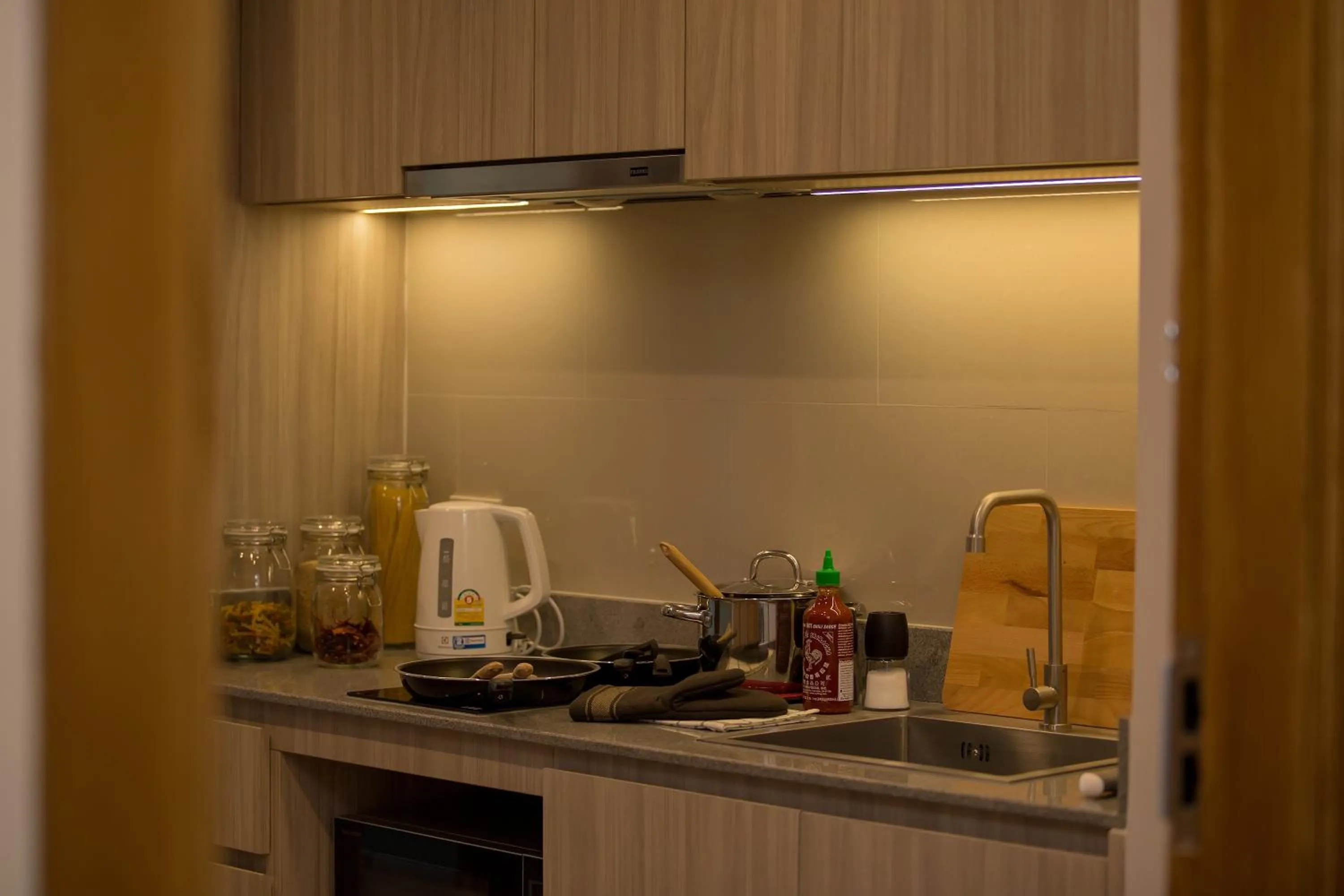 Kitchen or kitchenette in Oakwood Hotel & Residence Sri Racha