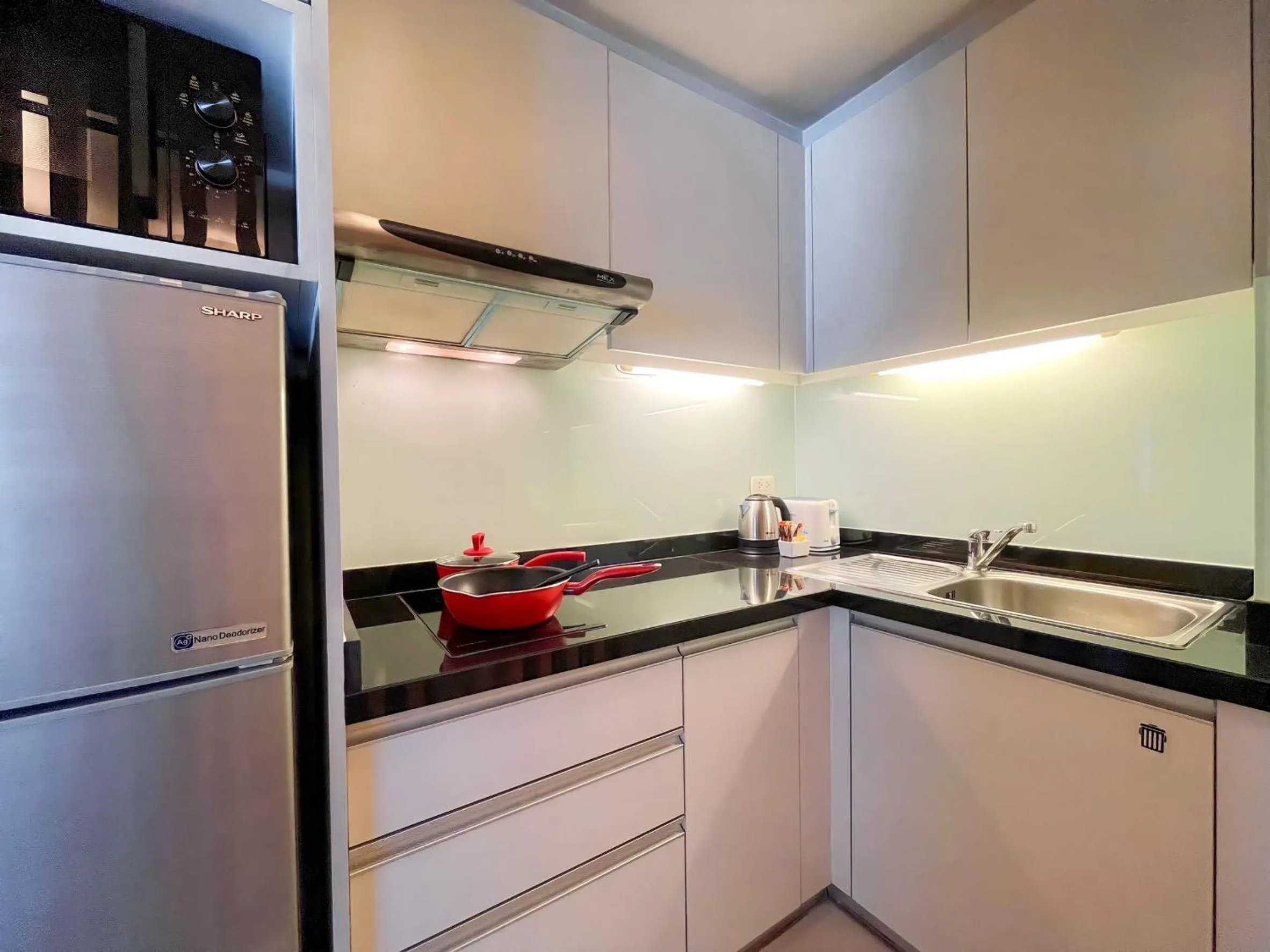 Kitchen or kitchenette in Sora Resort & Suites Sukhumvit