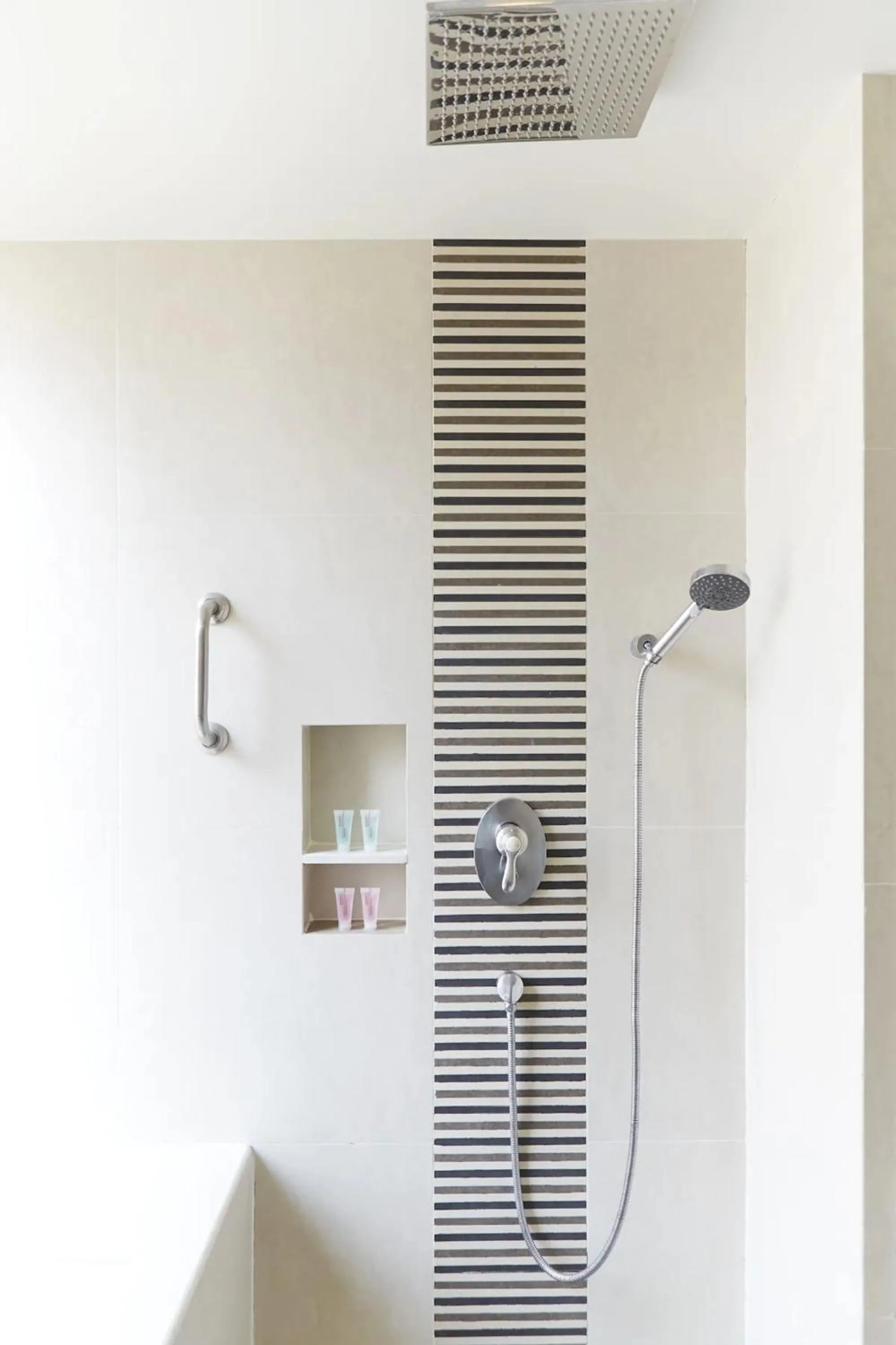 Shower in Sora Resort & Suites Sukhumvit