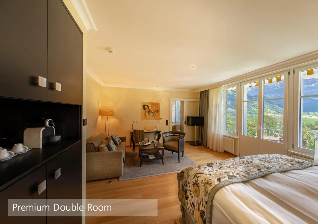 Living room, Bed in Lenkerhof gourmet spa resort - Relais & Châteaux