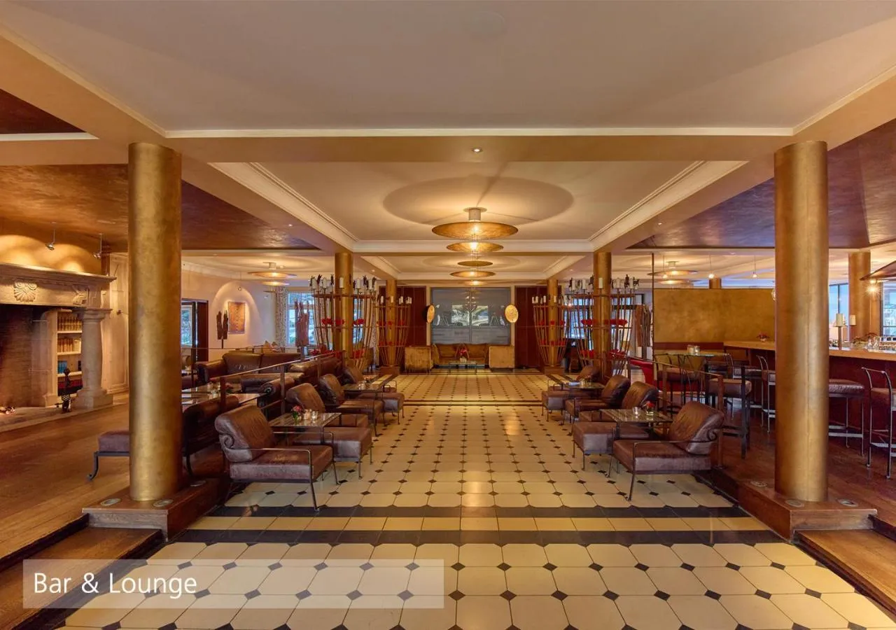 Lounge or bar in Lenkerhof gourmet spa resort - Relais & Châteaux