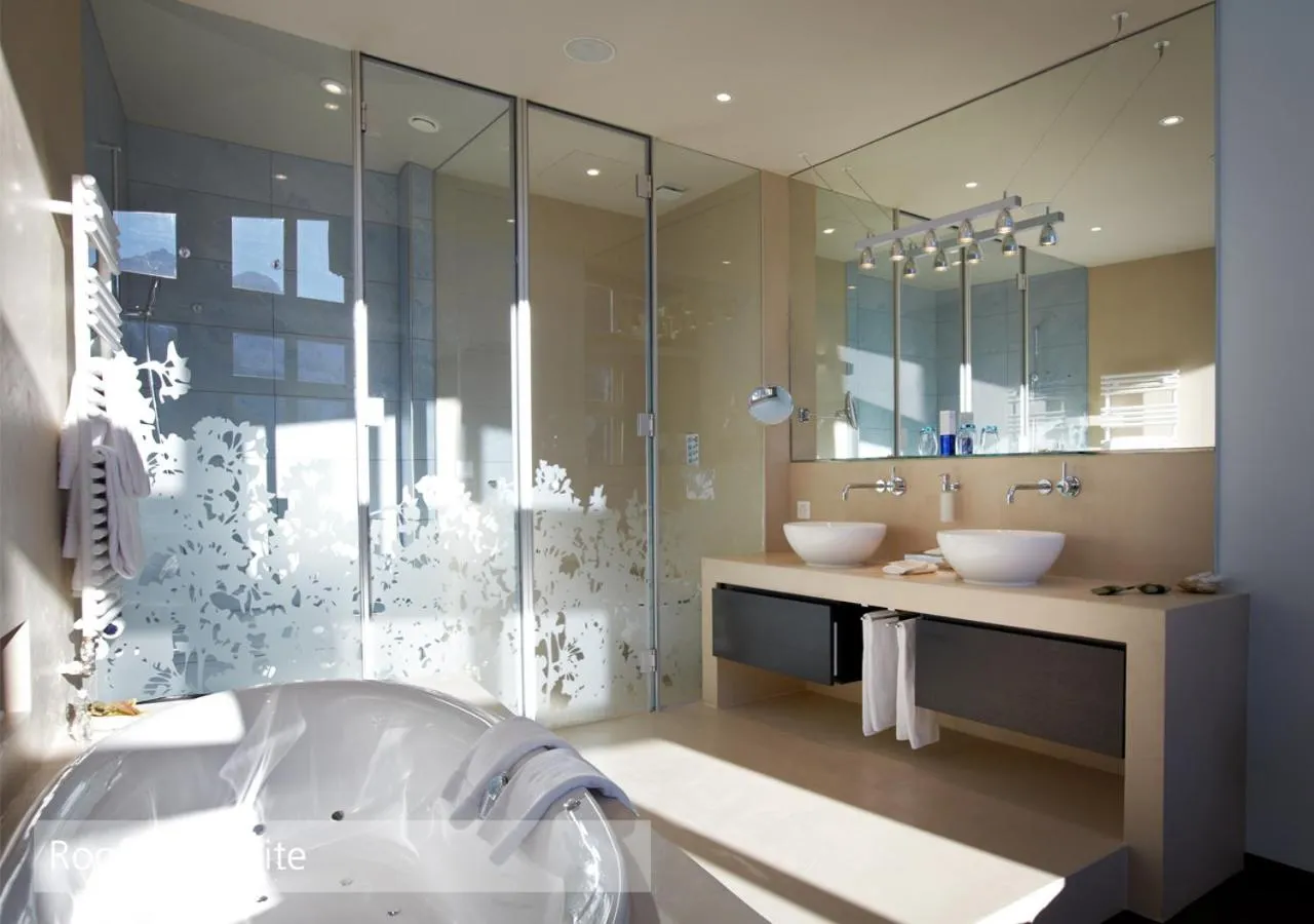 Bathroom in Lenkerhof gourmet spa resort - Relais & Châteaux