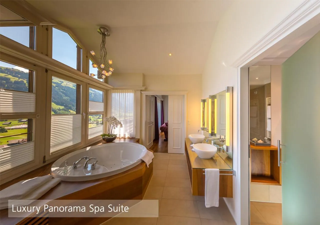 Bathroom, Bed in Lenkerhof gourmet spa resort - Relais & Châteaux