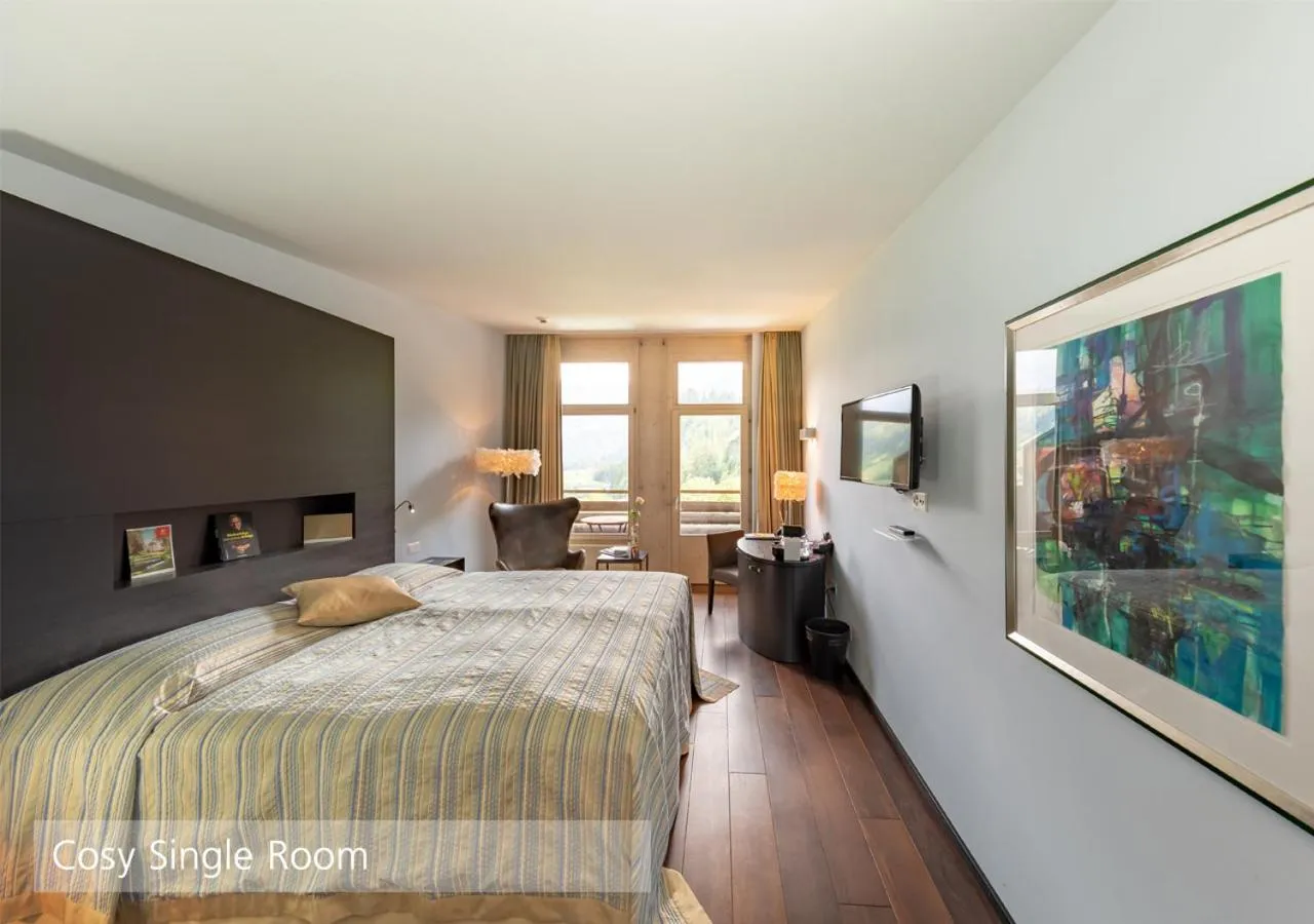 Bedroom, Bed in Lenkerhof gourmet spa resort - Relais & Châteaux