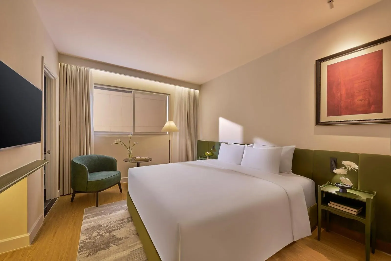 Living room, Bed in M Village Hotel Premier Thi Sách