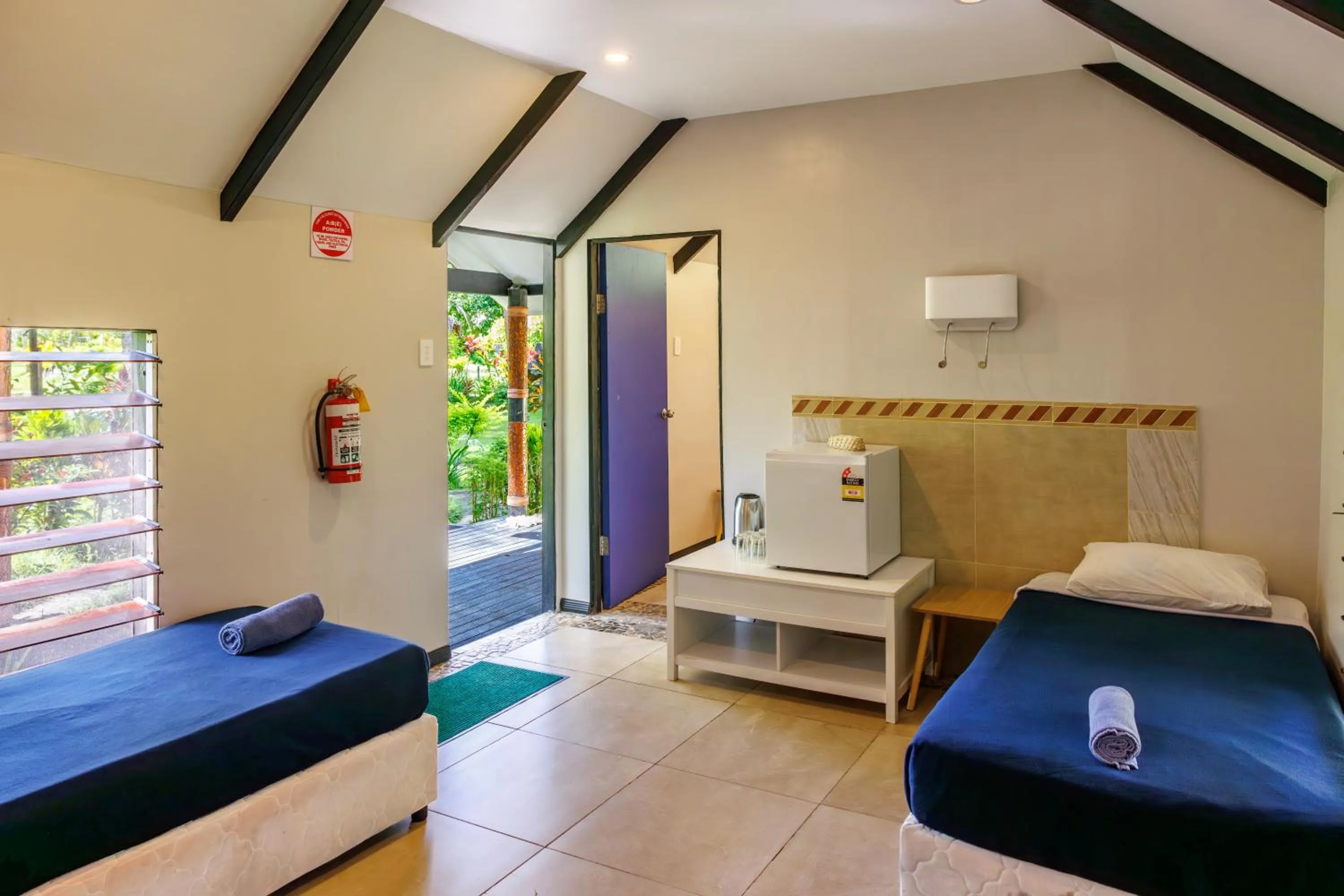 Bed in Mango Bay Resort