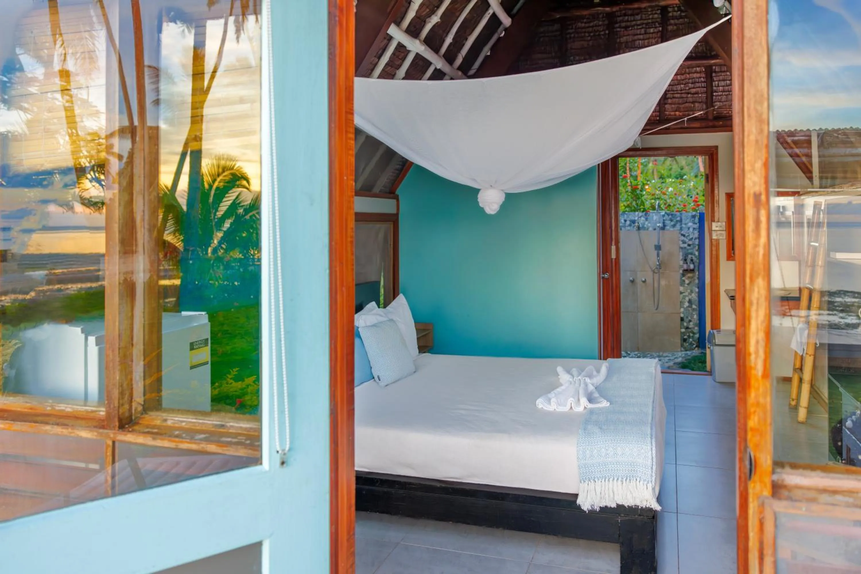 Bed in Mango Bay Resort