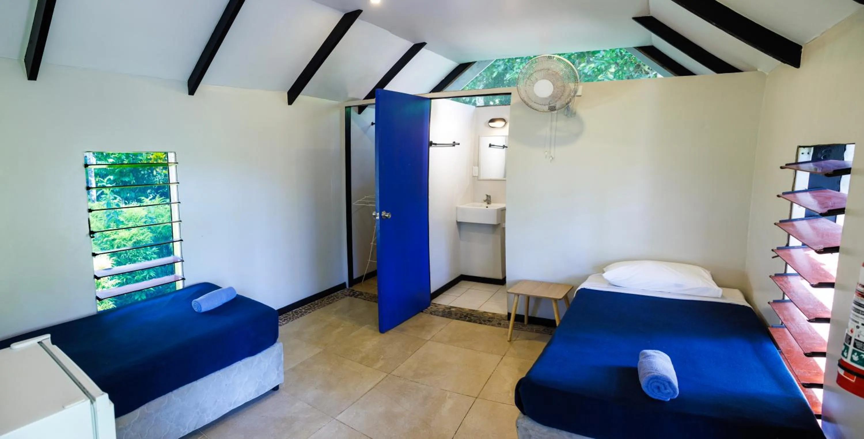 Bed in Mango Bay Resort