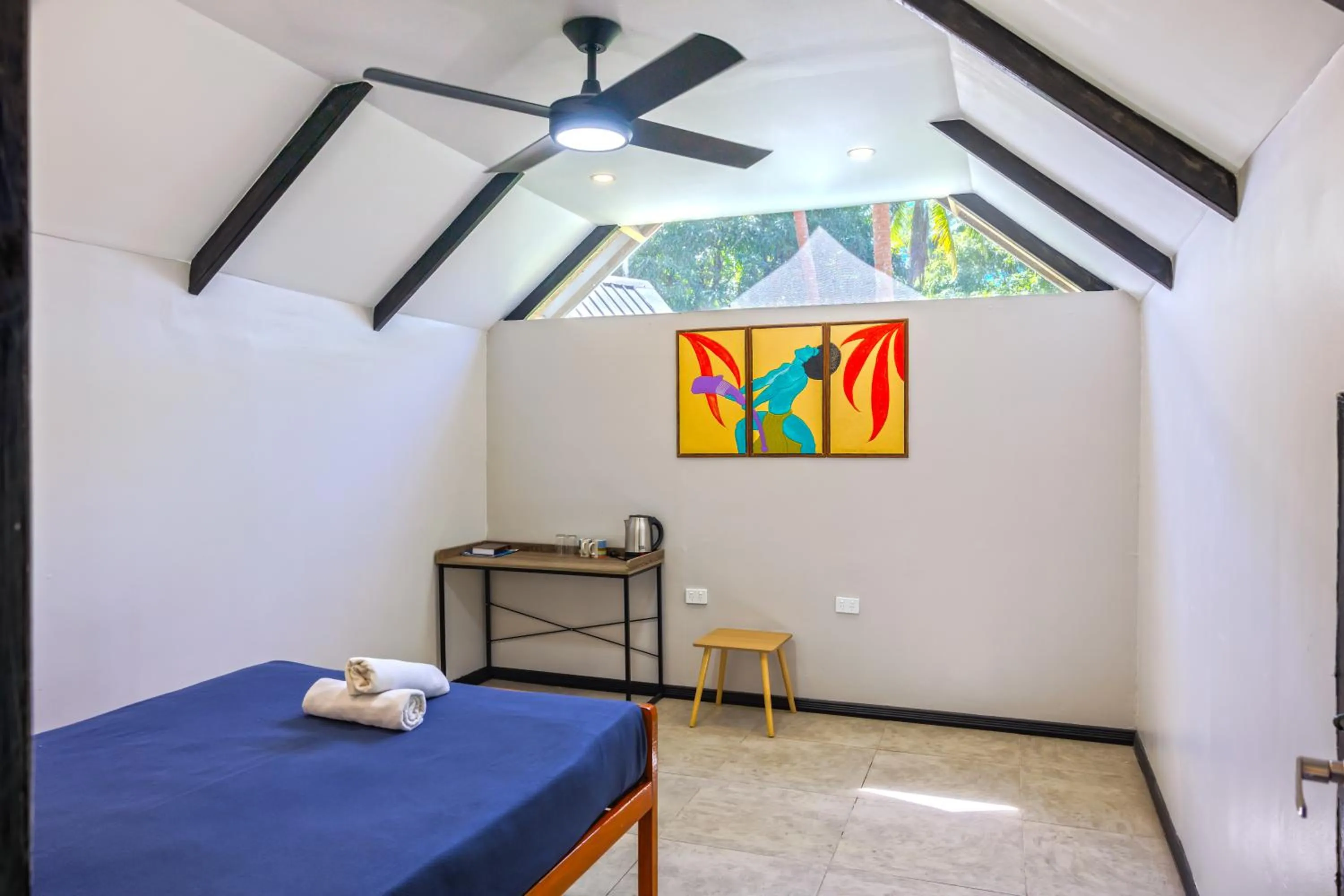 Bed in Mango Bay Resort