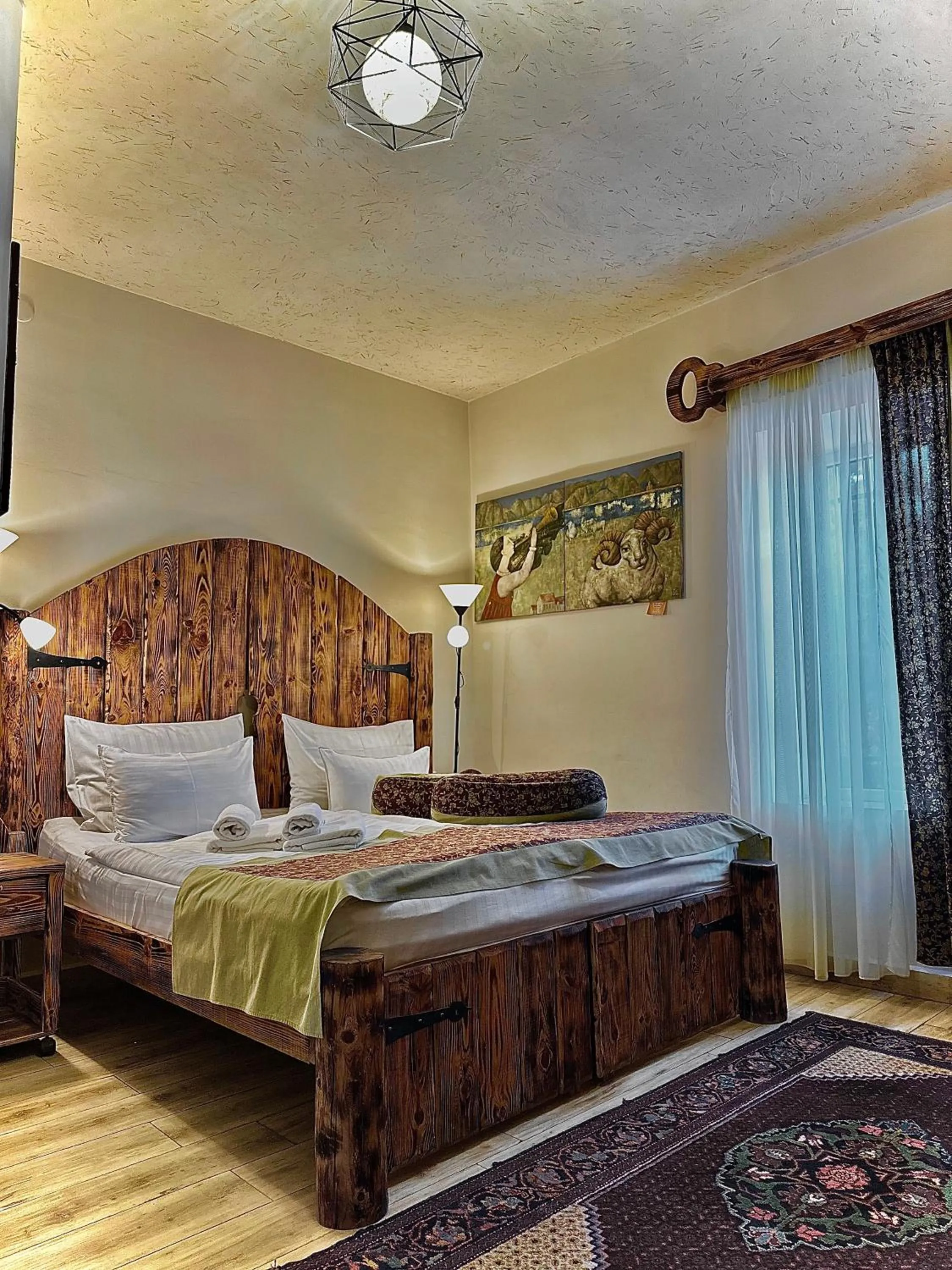 Bed in Machanents Art Hotel